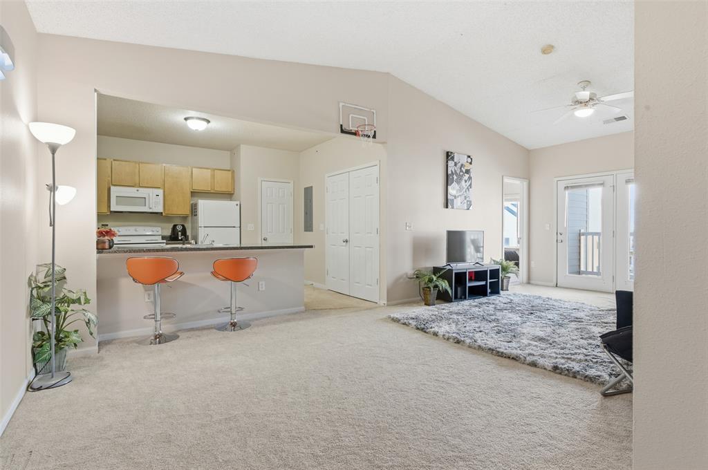 This well-maintained upper-level condo offers a clean, functional layout in one of Norman’s most convenient campus area locations. With two bedrooms, two full bathrooms, and an open living and dining space, the unit feels light and spacious, highlighted by vaulted ceilings and large windows that bring in natural light.The living area flows seamlessly into the kitchen, making it easy to entertain or maximize everyday functionality. Both bedrooms are generously sized, each with its own bathroom; an ideal setup for roommates, students, or tenants. The private balcony provides a quiet outdoor space and overlooks the community, adding an extra layer of livability.Located just minutes from the University of Oklahoma, Campus Corner, restaurants, and major highways, this property offers exceptional accessibility while remaining tucked into a well-established complex. Community amenities and exterior maintenance are handled through the HOA, making ownership straightforward and low-maintenance.Whether you’re looking for a smart investment property, housing for a student or faculty member, or a conveniently located primary residence, this unit checks the boxes for location, layout, and long-term value.