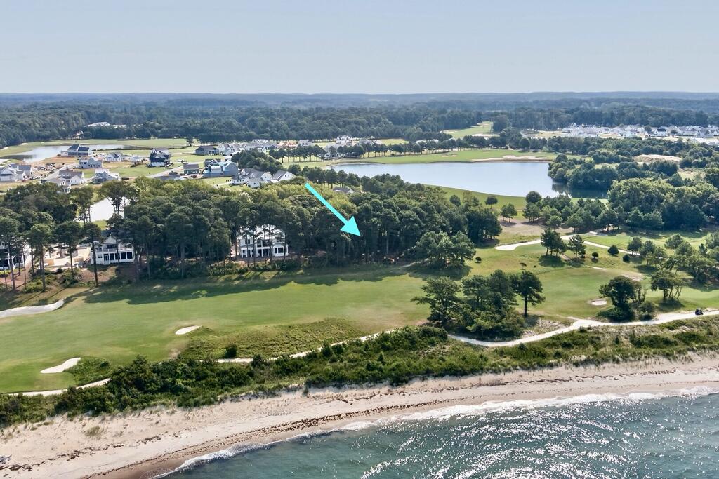 Rare Coastal Homesite Chesapeake Bay & Golf Views! Don't miss one of the last remaining homesites on Muirfield Bluffs at Bay Creek, offering an extraordinary opportunity to create your own custom coastal luxury retreat. Positioned to capture stunning western views of the Chesapeake Bay and the 5th hole of the Jack Nicklaus Signature Course, this truly one-of-a-kind homesite offers unbelievable sunsets and a rare setting. Enjoy the freedom to build on your own timeline. Bay Creek Builders Guild builders are available to help bring your vision to life and create the perfect custom home designed around the incredible views and coastal lifestyle. Bay Creek has been repeatedly recognized as one of the best places to live, with an exceptional collection of amenities including 27 holes of golf, new pickleball courts, multiple swimming pools, a private two-mile beach, state-of-the-art fitness center, social clubs, onsite dining, and year-round activities. Even more, hop in your golf cart and head to the nearby Historic District of Cape Charles, where boutique shopping, waterfront dining, summer concerts, winter festivities, and local events await. Homesites like this rarely become available. Don't let this opportunity pass you by. Call the listing agent today for more information today!