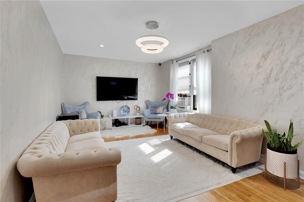 Residence 6E at 9040 Fort Hamilton Parkway is a true top floor two bedroom that lives larger than its footprint. With no neighbor above, a thoughtful floor plan, and a short wait list for parking, it checks off many of the boxes of today’s Bay Ridge home buyer.  Hardwood floors run throughout, catching the natural light across the main living spaces. A proper foyer opens into a separate dining area that fits a full table.  Beyond it, the living room stretches out with generous proportions and windows with natural light beaming through.The kitchen has been tastefully renovated, a windowed galley with stone countertops, full stainless steel appliances, a dishwasher, and ample cabinetry. The bathroom is equally refined, finished with marble inspired tile, a modern vessel sink, a mosaic floor, and a window inside the shower.Both bedrooms are full sized and well proportioned. The primary fits a king with room to spare. The second is generously sized and bright, flexible as a second bedroom, or a home office. Six closets throughout provide rare storage for a home of this size.The building is cat friendly, permits subletting after two years, and offers parking by wait list, notably shorter than most buildings. The BQE and Belt Parkway are minutes away by car, the 86th Street express bus is close by, and the R train is accessible at 4th Avenue and 93rd Street.  You’re surrounded by the best of Bay Ridge’s booming restaurant and business district, Dyker Beach Golf Course, Shore Road’s bike and scenic paths and so much more!Here’s your chance to own a bright, quiet, beautifully maintained top floor two bedroom in one of Bay Ridge's most established buildings. Monthly maintenance is $1,135.