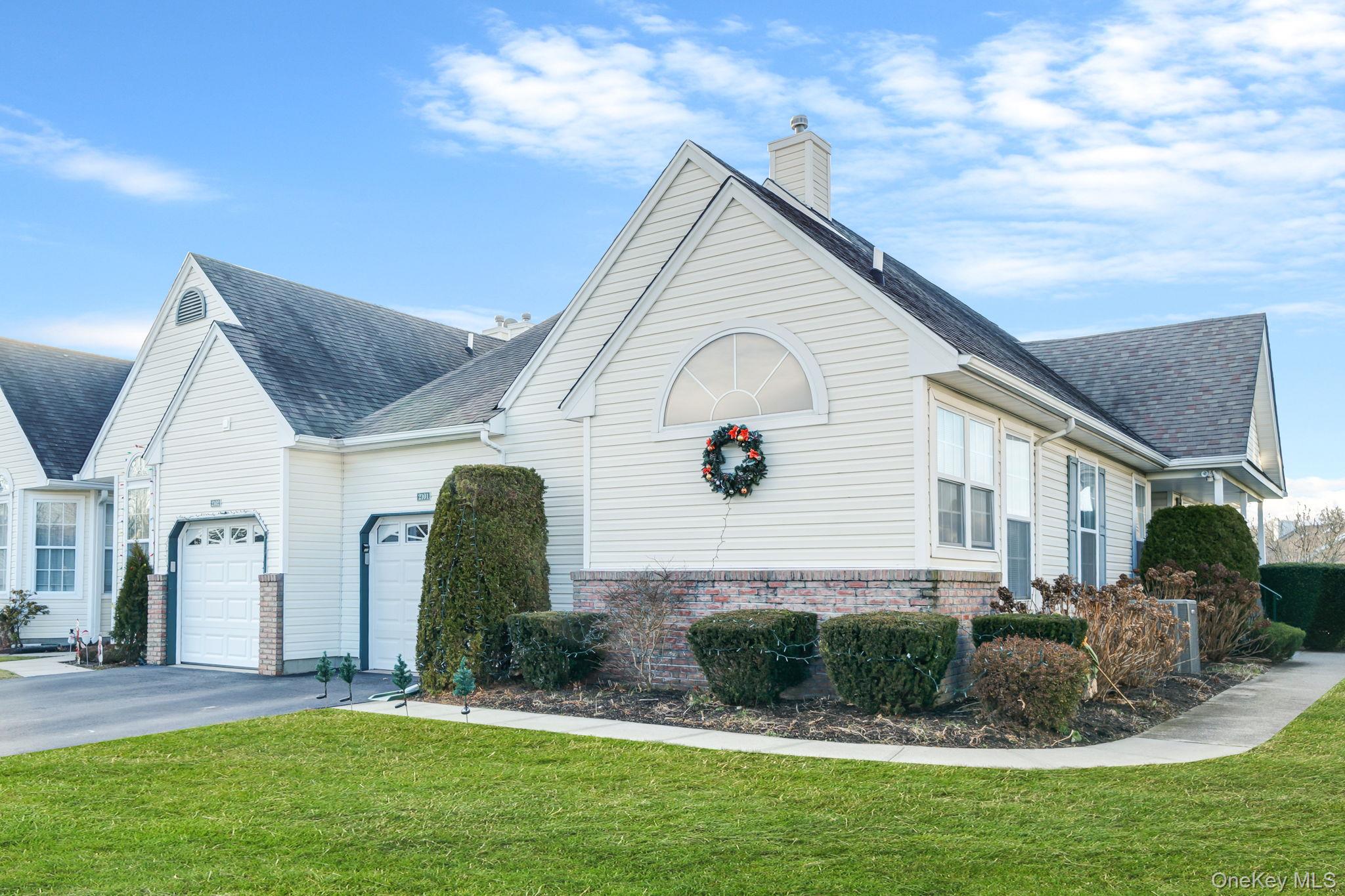 Welcome to this beautifully maintained 2-bedroom, 2-bath condo in a gated community offering an open and airy layout with cathedral ceilings in the living and dining rooms. The spacious sun-filled kitchen features granite countertops, and sliders leading to a Trex deck overlooking a tranquil pond—perfect for relaxing or entertaining. Wood floors run throughout most of the home. The primary suite offers an updated bath and generous closet space. A fully finished basement adds exceptional versatility with room for guests, a home office, workshop, and abundant storage.  Additional highlights include gas heat, central air, LED Lighting, private garage, and basement storage. This home has direct access to the clubhouse, pool, dog run, playground and sports area, so if you would like to be near the action, “this is your spot”. Located near transportation, shopping, and the university, this home offers comfort, convenience, and lifestyle