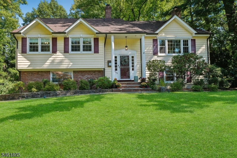 Set in a desirable residential neighborhood on Westfield's North Side, this custom-expanded home offers nearly 4,000 square feet of thoughtfully designed living space, including six bedrooms and three full baths.Expanded in 2011, the home combines generous proportions with a versatile layout and a sense of privacy. The main level features a bright living room that flows into the open-concept kitchen, dining area and family room, creating an inviting setting for both everyday living and entertaining. Just off the family room, a full deck overlooks the yard and provides a private outdoor retreat.The 2011 expansion added a private second-level primary suite with a spacious walk-in closet and full bath. Three additional bedrooms and another full bath are conveniently located on the main level.The expansive lower level offers additional flexibility with a spacious recreation room, two bedrooms, a mudroom and a generously sized office with a cozy fireplace an ideal setting for working from home. Outside, a covered patio surrounded by privacy offers a comfortable space for relaxing or entertaining.With multiple living areas, abundant closets, excellent storage and inviting outdoor spaces, this well-appointed home offers the room and flexibility to suit a variety of lifestyles in one of Westfield's most sought-after neighborhoods. SQFT is approximate.