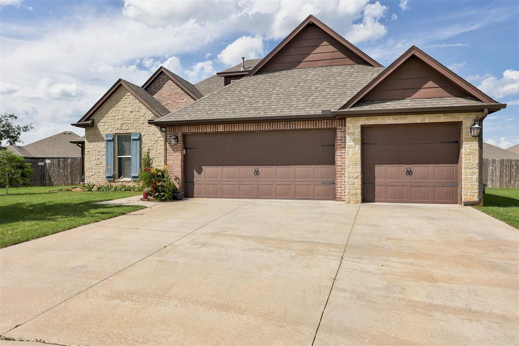 Beautiful 4-bedroom, 3.5 bath home located on quiet cul-de-sac! The versatile fourth bedroom can also serve as a private office. Open-concept floor plan features a spacious living area with a stunning stone fireplace. The kitchen offers a large island with bar seating, pantry with coffee bar, and plenty of storage. The oversized primary suite includes double vanities, a soaking tub, separate shower, large closet. secondary bedrooms share a jack-and-jill bathroom. Upstairs you'll find a spacious bonus room with a full bath, perfect for a game room, media room, guest suite, or additional living space. storm shelter located in the 3 car garage.