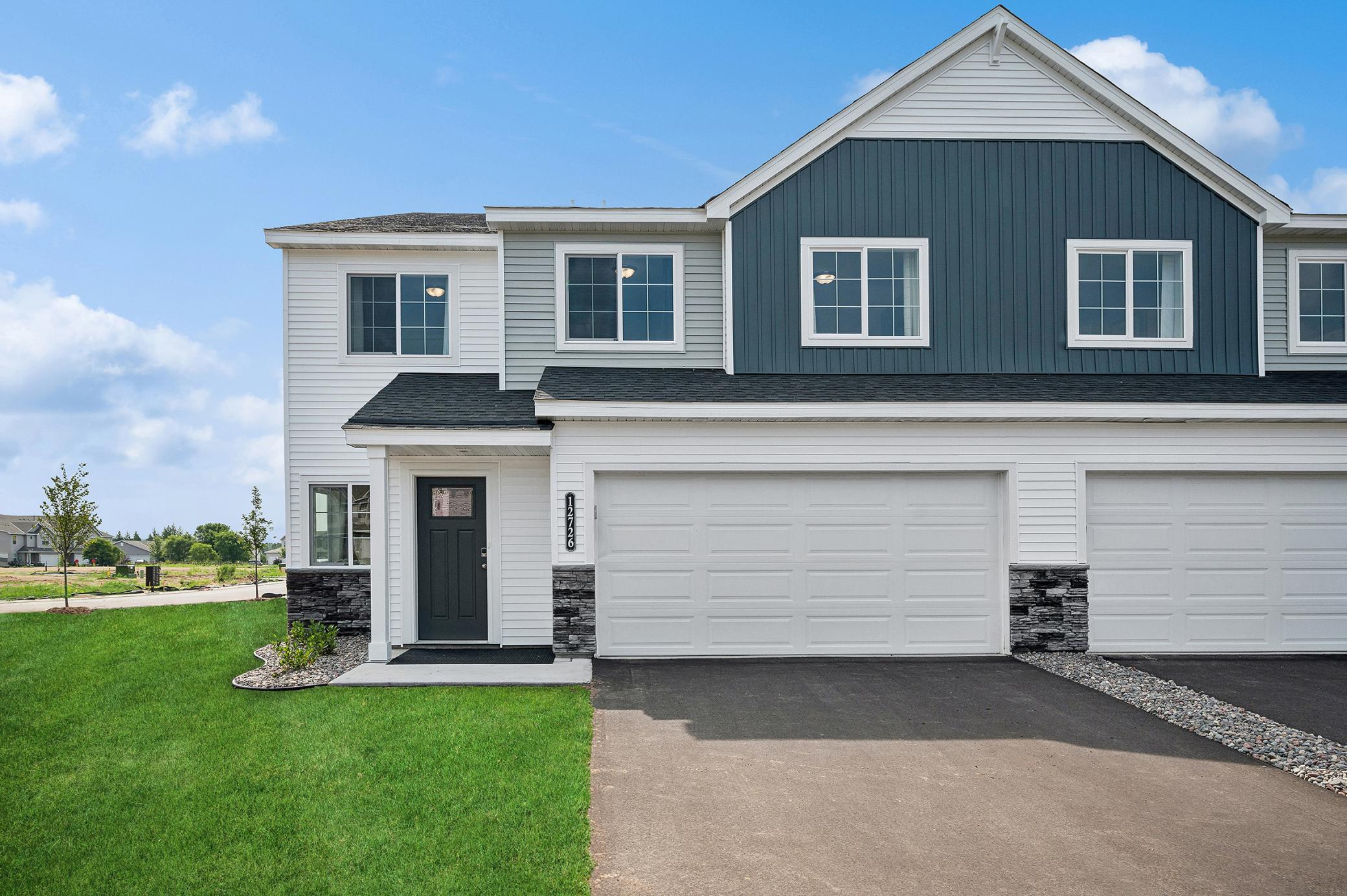 Discover a home that proves you don't have to compromise style, comfort, or convenience. This beautifully designed Hazelwood townhome by JP Brooks in Meadowbrook offers the perfect balance of modern finishes, functional living spaces, and easy homeownership.Step inside and you'll immediately appreciate the bright, open layout designed to bring people together. Whether you're hosting family for the holidays, gathering with friends around the fireplace, or enjoying a quiet night in, the seamless flow between the kitchen, dining area, and great room makes every square foot feel intentional.The thoughtfully designed kitchen combines everyday function with timeless style, featuring quartz countertops, stainless steel appliances, luxury vinyl plank flooring, painted on-site millwork, and quality finishes that are built to stand the test of time.Upstairs, you'll find a private owner's suite complete with a spacious walk-in closet and ensuite bath, along with two additional bedrooms and a flexible loft that can easily adapt to your lifestyle. Whether you need a home office, homework space, media room, or cozy reading nook, you'll have the flexibility to make it your own. An upper-level laundry room adds everyday convenience exactly where you need it.Outside, enjoy all the benefits of a beautiful new home without sacrificing your weekends. Lawn care and snow removal are professionally maintained through the HOA, giving you more freedom to spend time doing what matters most.Located in Monticello's welcoming Meadowbrook community, you'll enjoy convenient access to Interstate 94, Highway 25, parks, shopping, restaurants, and local schools, making work commutes and everyday errands simple.Whether you're purchasing your very first home, simplifying your lifestyle, or looking for the confidence that comes with brand-new construction, this home offers quality craftsmanship, thoughtful design, and lasting value. Come experience everything Meadowbrook has to offer and see why this home feels just right from the moment you walk through the door. Estimated completion date of mid November 2026.