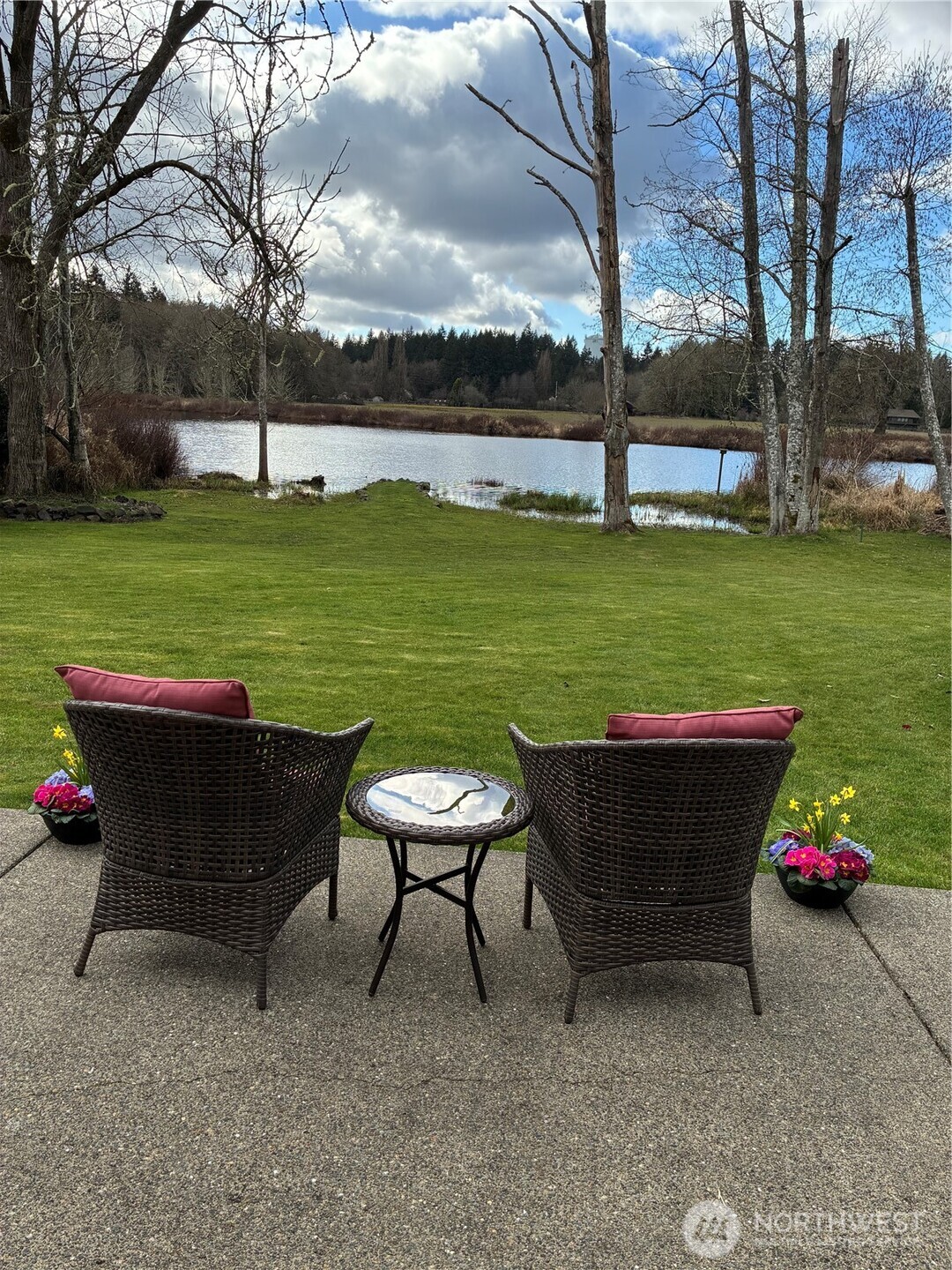 Waterfront rambler in ideal setting, close to town yet feels like vacation-land. Chambers Lake in back yard with 77 feet of no-bank waterfront, and Chehalis Western Bike & Walking Trail adjoins the full length of neighborhood with access points at North and South. Three bedroom, 1.5 bath that lives like 2 bath due to ingenious Jack and Jill style. Primary suite private bath shares the tub/shower with hall bath. Easy care vinyl plank flooring, updated kitchen and baths. Grand picture windows and sliders offer views of lake, nature and pastureland that can't be beat. Spacious patio for outdoor entertaining. Fruit trees, level property great for gardens, play or pets. Dead end street tucked behind Panorama for peace and quiet and no traffic.