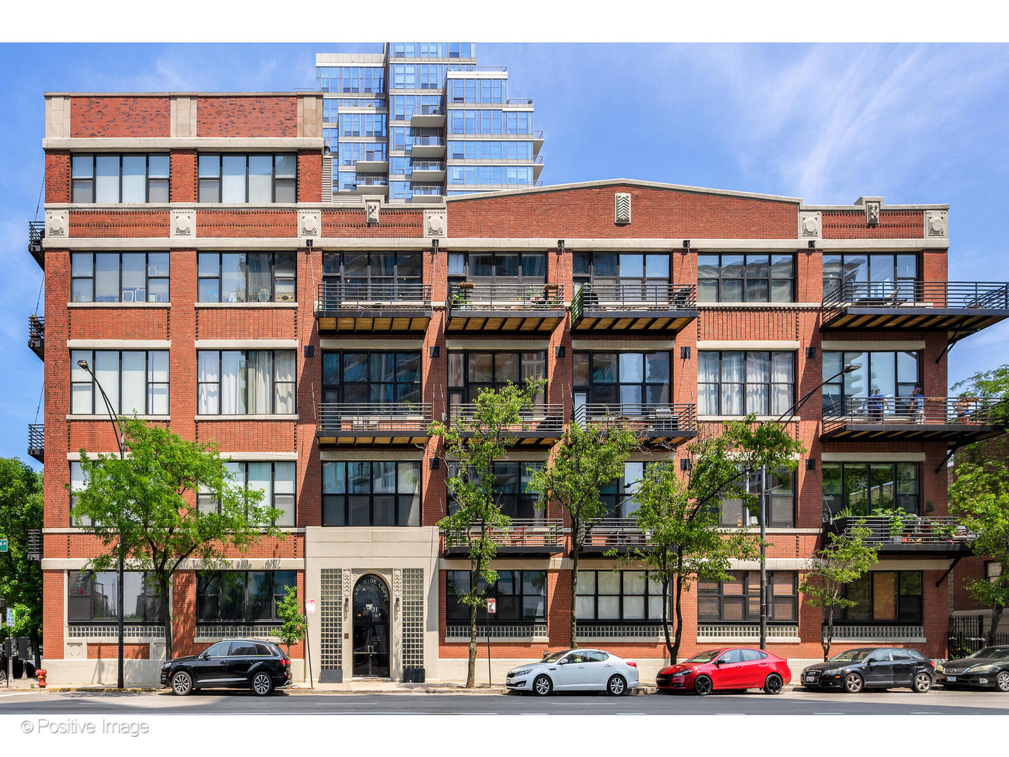 Spectacular penthouse duplex loft with stunning, skyline views in the heart of Chicago's vivacious South Loop neighborhood! Gut rehabbed in 2017, the owners reimagined the space, creating a home that is as vibrant as it is chic. Upon entry, an elevated entry foyer highlights the soaring, 14 ft timber beamed ceilings. A few steps down into the living space, exposed brick, an open floor plan, flawless hardwood floors, and giant windows help create a cool, yet relaxed vibe throughout the residence. The spacious living / dining area features a two-sided Napoleon BHD4PG Peninsula w/ fire glass fireplace and access to a 29ft balcony showcasing stunning, north-facing views. The living space flows seamlessly into an impressive cook's kitchen featuring Azul Imperial Quartzite countertops, Koak Design (Netherlands imported) Island wood cabinets / Dover white shaker wall cabinets, a Rockler Rolling ladder for high cabinets & storage, custom tile backsplash, an oversized island with breakfast bar illuminated by Elida Antique Brass Island pendant lights, and top-of-the-line Viking appliances. The primary suite enjoys the other side of the two-sided fireplace along with an abundance of natural light, an Emerson ceiling fan, custom designed walk-in closet with Red Elm Slab Closet door, and a luxurious ensuite bath with a steam shower and Hans Grohe Axor brushed nickel overhead rain shower, handheld wand and regular showerhead, Columbia double sink bathroom vanity, Dual Grohe Faucets- Aeropure, Kohler toilet, and a 72x36 Lighted vanity mirror. A graciously sized second bedroom clad in exposed brick walls enjoys an exquisitely appointed ensuite bath with Kohler Chrome Tub/Shower trim & toilet, Black Aluminum glass partition, and 24 x 32 Dimmable light in mirror. A laundry closet with stackable Whirlpool washer and dryer. Upstairs you will find a second level, a new addition and private roof deck added to the property in 2021. The stairway is lit by a Gravity chandelier by Forestier. At the top of the stairs, a family room awaits complete with a wet bar with and Abosi wine/beverage fridge, refrigerator and freezer drawers, Redrock Verge Hex Tess backsplash tile, Majestic 3cm Quartzite countertops, a Brizo kitchen faucet pulldown, and Crystorama Calypso Mini Chandelier. A wall of floor-to-ceiling windows slides open and leads to a 714 SQFT private roof deck - a true urban oasis with incredible skyline views. This home is the perfect place both to entertain on a large scale as well as live comfortably with many serene spaces to relax and unwind. The second level also features a third bedroom with white, brick walls and timber ceilings and a full bath with Kohler Chrome Shower trim, Concrete floor tile, and a unique wall-hung sink. One deeded parking space included in the price. Ideally situated within close proximity to the lake, parks, playgrounds, Soldier Field, Museum Campus, schools, and public transportation.