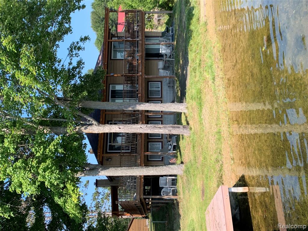 Come live the vacation life off this all sports lakes! This 2 story home with 4 bedrooms and 2.5 baths offers A huge wrap around deck to enjoy those great summer  nights or sit by your bonfire and roast some smores.  Inside this cottage offers 2 living rooms private laundry and Primary bedroom with private bath. Home also Has 2 huge docks to park boats are jet skies.  Come check this one out before its gone.  Seller is a licensed real-estate.