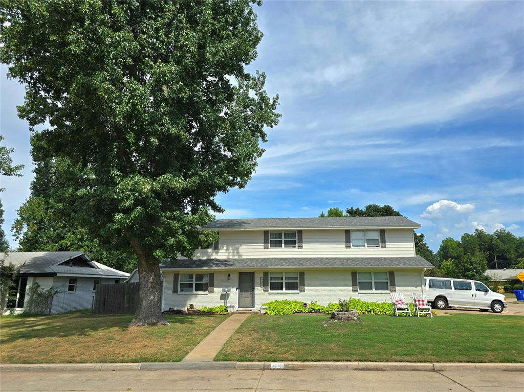 Location! Location! Location!  Just walking distance from Monroe Elementary and only 1.5 miles from Oklahoma University! Step into this well cared for modernized home and don't miss the details.  4 bedrooms, 3 full baths, 2 car garage and spacious backyard with cozy covered patio for friends and family gatherings. The updated texture and newly painted walls and cabinets breath new life and radiance into this home! Relax and enjoy the comfort of luxury wood look vinyl floors throughout the main living areas and bedrooms leading to a stylishly carpeted staircase. Step into the thoughtfully renovated kitchen with updated appliances, abundant cabinetry, and a bonus pantry/storage closet just steps away! Three large and multipurpose bedrooms offering flexible options for a playroom, media room, craft space, gym, etc.  This home features a flexible forth room, with built in shelves and cabinets, perfect for a dedicated study or a cozy smaller bedroom! You will have lot's of options!  Third full bath with walk-in shower was recently added and a nice size storage closet.  In addition there is a cozy study area/sitting nook conveniently located in the upstairs hallway.  This home is perfect for your growing family, college students or an investment. Great curb appeal and located on a corner lot in the highly sought after Hilltop Addition!