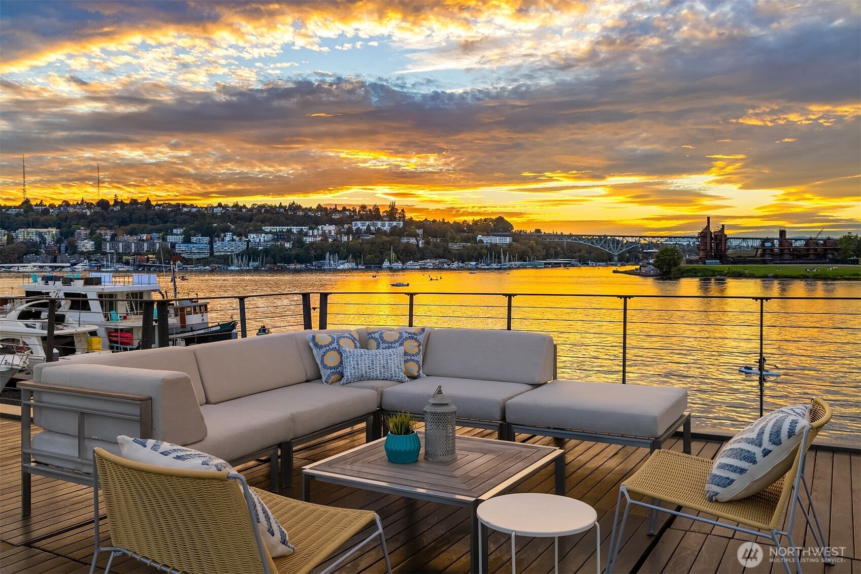 Rare, front-row, Roanoke Reef. Breathtaking views, city skyline, Queen Anne, Gas Works Park, the Olympics and beyond from every floor. Copper trim, exquisite Honduran mahogany millwork, classic sprung roof detail, nautical skylights—reminiscent of elegant yacht design—flood interiors in natural light. Chef’s kitchen, Sub-Zero, Wolf range, double ovens, custom cabinetry, kneading station. Revel in astounding rooftop deck views on the 4th of July, enjoy daily maritime entertainment from wrap-around windows in the great room, sit in your hot tub to watch the snow fall on the Christmas boat parade. 46’ boat moorage. Two covered parking spaces. Two storage units. Gated entry. Fee-simple ownership. More than a home, an exceptional way of life.