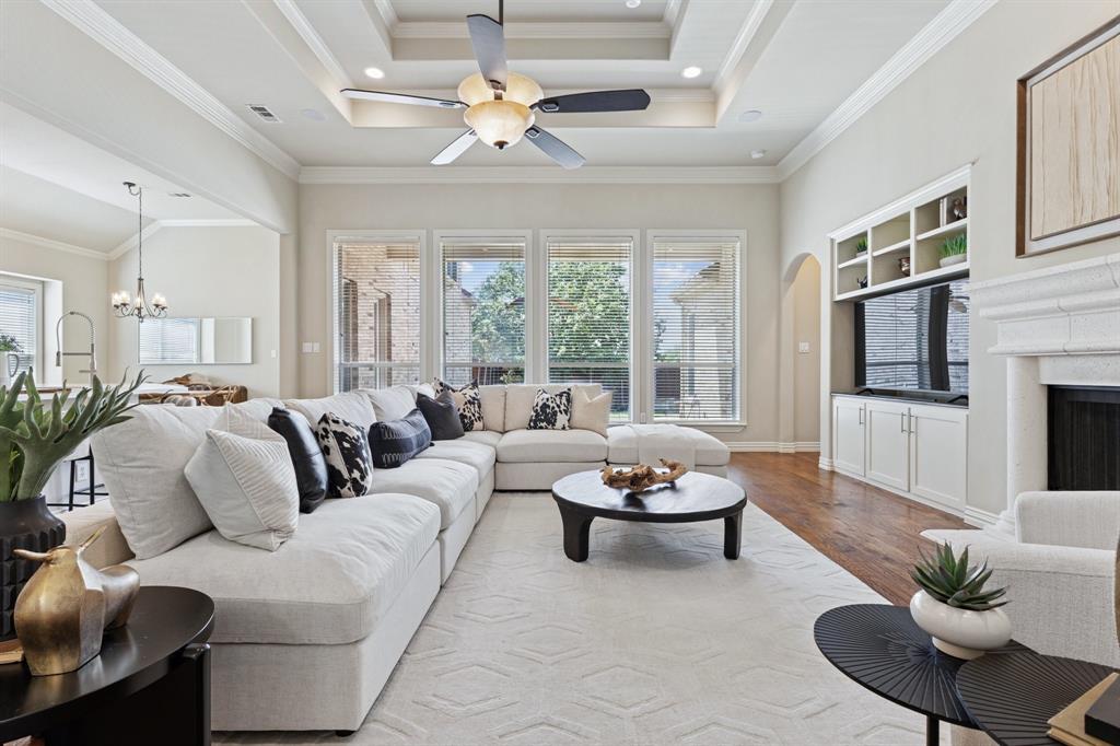 Single Story Luxury Living with bonus upstairs game room! Live the Country Club Life in the exclusive, gated, and guarded community of Cottonwood Valley! At 2015 Crockett Circle, you're just a short golf cart ride away from the Ritz-Carlton and the Nelson Sports Club, offering memberships for socialites, tennis players, and golfers.  This custom home is surrounded by multi-million-dollar estates and features four bedrooms on the first floor! Enjoy your private, downstairs primary suite with rich hardwood floors, a sitting area, walk in shower, separate bath, and dual walk-in closets. The spacious lot includes a pool-sized backyard with an elegant pergola, flagstone patio, outdoor firepit, and room for a grill-perfect for entertaining! The open-concept kitchen boasts quartz countertops, a new vented cooktop, stainless steel appliances, and a large island with bar seating. A huge family room with a classic stone fireplace is bathed in natural light from panoramic windows overlooking the flagstone-covered patio. Need a media room? The expansive game room over the three-car garage offers surround sound and a wet bar. Enjoy 2 new ACs with 10-year warranties and new carpeting! 24-Hour Open House - Call us today for showing times!