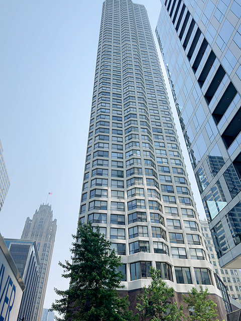 Priced to Sell! A special opportunity to purchase a top-floor penthouse in River North, in a full-amenity luxury high-rise building. This unit is high value priced and is just waiting your TLC to become a most luxurious home setting. Features include beautiful custom cabinet kitchen, built-in bar for entertaining, wood burning fireplace, in unit laundry, spacious and open living and dining area, three bedrooms plus additional den or office space. Master bedroom suite features soaking tub and separate shower. Hardwood flooring throughout. Sweeping panoramic views across three exposures with views of Lake Michigan, Chicago River, downtown city skyline and iconic Chicago architecture. Garage parking space included. Come see and unlock unlimited potential.