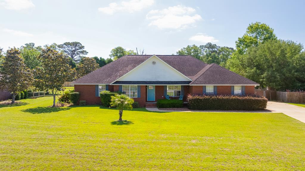 Beautifully maintained home located in the desirable Hunter's Cove Subdivision! Situated on a spacious 0.8-acre lot, this 4-bedroom, 2-bath home offers the perfect combination of comfort, functionality, and space both inside and out. From the moment you arrive, you'll appreciate the attractive curb appeal, expansive yard, and welcoming feel of this property.  Inside, you'll find a bright and functional layout featuring a formal dining room perfect for hosting family gatherings or entertaining guests. The kitchen offers ample cabinet and countertop space and flows nicely into the main living areas for easy everyday living. There is also a bonus room that would make the perfect home office, playroom, workout space, or flex area to fit your needs. The spacious primary suite provides a true retreat with plenty of room for oversized furniture and features an en suite bathroom complete with double vanities, a soaking tub, separate shower, and generous closet space throughout.  Step outside to enjoy the screened-in porch overlooking the large backyard — an ideal spot for relaxing, entertaining, or enjoying peaceful evenings at home. The backyard also features a firepit area, perfect for gathering with friends and family year-round. Additional features include a 2-car garage, spacious bedrooms, and plenty of outdoor space with room to enjoy, garden, or play.  Conveniently located in Hunter's Cove and just 10 minutes from downtown Thomasville, this home offers the privacy of a larger lot while still being close to shopping, dining, schools, and everyday conveniences.