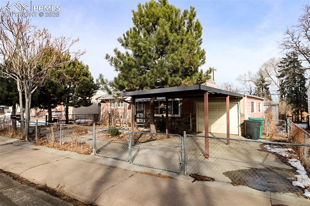This property is located with easy access to Fort Carson.  It does need updating.  It could be your diamond in the rough.  2 bed, 1 bath, 1 attached car extend garage and another single detached garage.  2 sheds for extra storage.