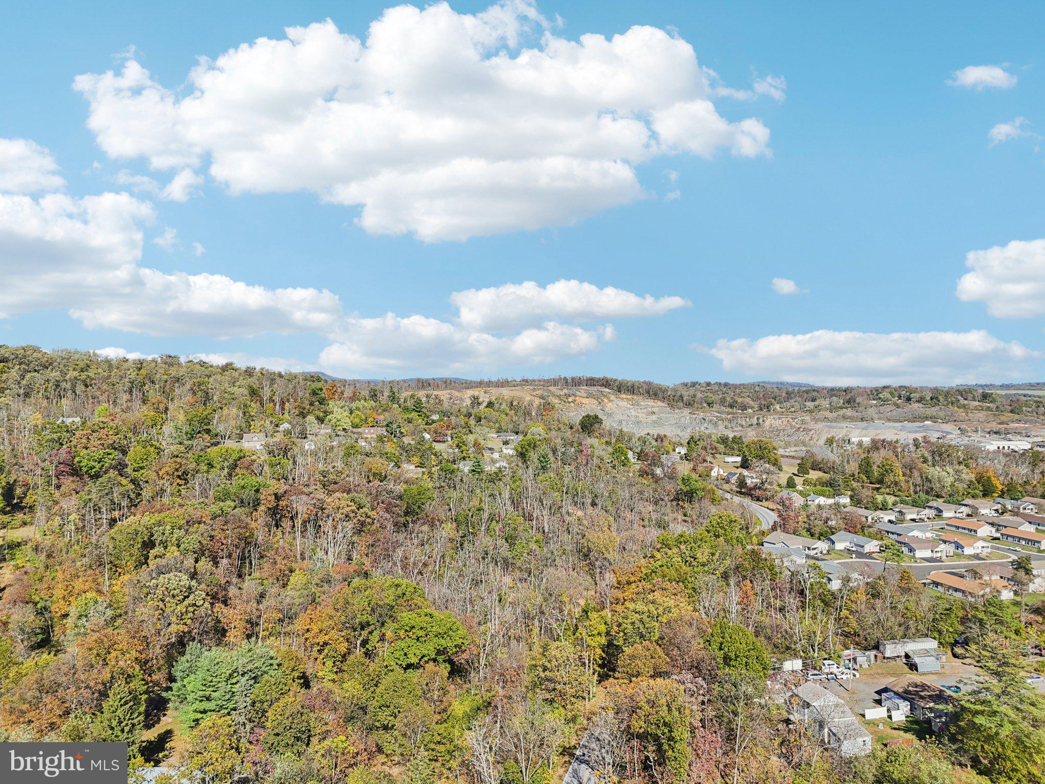 Discover an exceptional investment opportunity with this expansive 9+ acre parcel of land, perfectly positioned for future development or personal use. The lot features a serene, wooded landscape, providing a tranquil setting that enhances its appeal. Imagine the possibilities: subdividing the land for multiple residential units or creating a private estate that offers both seclusion and accessibility. With the current trend of urban expansion, it's strategically located to benefit from future growth in the area. The future is bright for those who act now-make this 9-acre gem the cornerstone of your investment portfolio today!** Do Not walk the lots without first contacting the Listing Agents and setting an appointment. Broker/Agent Remarks on Data Accuracy: Listing Agents and Sellers have made every effort to provide accurate information; however, all details are provided for informational purposes only and are not guaranteed. It is the sole responsibility of the Buyer and their agents to independently verify all property information, including measurements, tax data, zoning, and all other material facts, prior to closing.