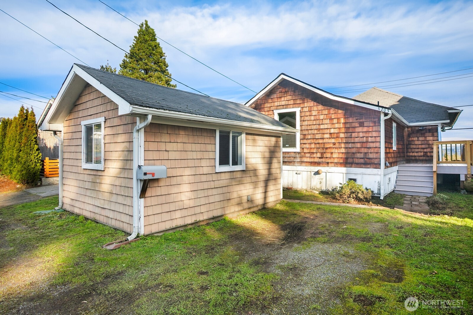 Located close to the vibrant Columbia City Historic District, this home offers easy access to a variety of restaurants, library, Farmer's Market, shopping, and nearby entertainment options. The home features tall ceilings, expansive windows overlooking a newer deck, a mini split air conditioner, new dishwasher, and newer dryer. Includes additional detached studio perfect for home office or conversion to DADU. Conveniently located near Light Rail, Genesee Park, PCC, Pea Patch, and Jefferson Golf Course. Spectacular territorial views of the Cascades and downtown Bellevue!