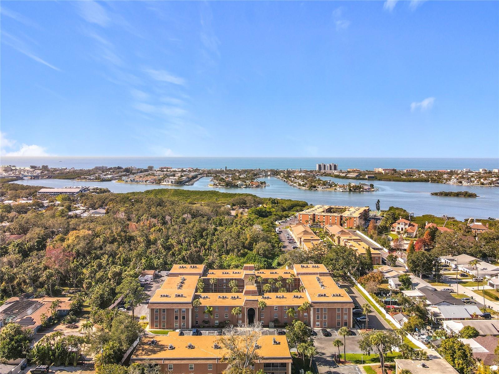 Your Coastal Escape Awaits on Florida’s West CoastWelcome to effortless coastal living in this top-floor 1-bedroom, 1-bath condo nestled in the heart of Pinellas County. Perfectly balancing affordability and luxury, this residence is just steps from the sparkling waters of the intracoastal and the Gulf of Mexico.Step inside to an inviting open-concept layout where the kitchen flows seamlessly into the great room—ideal for entertaining or enjoying a quiet evening at home. The bedroom overlooks a peaceful park, offering tranquil views and restful nights away from the crowds.Located in the highly desirable Atlantis community, residents enjoy an impressive array of resort-style amenities. With private access to the Intracoastal Waterway, spend your days swimming, kayaking, paddleboarding, canoeing, or fishing. On land, relax with two heated pools, a hot tub, tennis courts, tiki huts, grilling and picnic areas, shuffleboard, and a fully equipped fitness room.The community also features a clubhouse with a pool table and internet room, plus a private gated entrance to scenic Bonner Park—your own lush natural retreat.Just minutes from Indian Rocks Beach and conveniently located near Tampa International Airport (30 minutes), St. Pete–Clearwater Airport (15 minutes), Clearwater Beach, and St. Pete Beach, this home puts the best of Florida living right at your doorstep.Low-maintenance, low-stress, and endlessly enjoyable—this is where every day feels like a vacation. Schedule your private showing today and start living the coastal lifestyle you’ve been dreaming of.