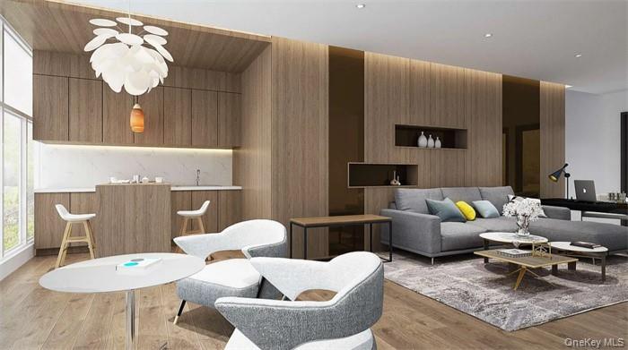 Discover a rare opportunity to own one of Long Island City’s most desirable two-bedroom residences. Residence 7E at Star Tower offers a spacious 1,228 SF corner layout, combining sleek modern finishes with exceptional scale and abundant natural light. This oversized two-bedroom, two-bath home is rarely available in LIC, featuring soaring 11-foot ceilings and expansive floor-to-ceiling windows that create a bright, open, and airy living environment. The thoughtfully designed layout includes generous living and dining areas, a functional floor plan, and ample storage throughout. Additional conveniences include an in-unit washer and dryer as well as central heating and cooling, offering comfort and ease for modern city living.Star Tower is a modern glass and steel luxury condominium rising 25 stories in the heart of Long Island City, offering breathtaking panoramic views of the Manhattan skyline. Ideally located just one subway stop from Midtown Manhattan, the building provides exceptional convenience, with multiple subway lines (N, W, R, 7, E, M, G) just two blocks away. Residents enjoy over 14,600 square feet of premier amenities, including a landscaped rooftop sun terrace with cabanas, a SkyLounge with billiards, and sweeping skyline views of the Empire State Building, Chrysler Building, and One World Trade Center.A standout feature is the expansive private residents-only park, complete with a Great Lawn, children’s playground, and serene Zen garden. Additional amenities include a state-of-the-art fitness center with an indoor waterfall, attended lobby, 24-hour video intercom system, private parking with a robotic car system, bike room, media lounge, and private storage. The building is pet-friendly. Residences feature bright exposures, floor-to-ceiling windows, and ceilings up to 11 feet, filling each home with natural light. Interiors are finished with oak hardwood floors, spacious walk-in closets, and designer kitchens equipped with Fisher & Paykel and Bosch appliances, quartz countertops, and glass backsplashes. Spa-like bathrooms include Kohler fixtures, Italian vanities, and refined stone finishes.With 5-star amenities, a 15-year tax abatement, and low common charges, Star Tower represents an exceptional opportunity for modern luxury living in Long Island City.