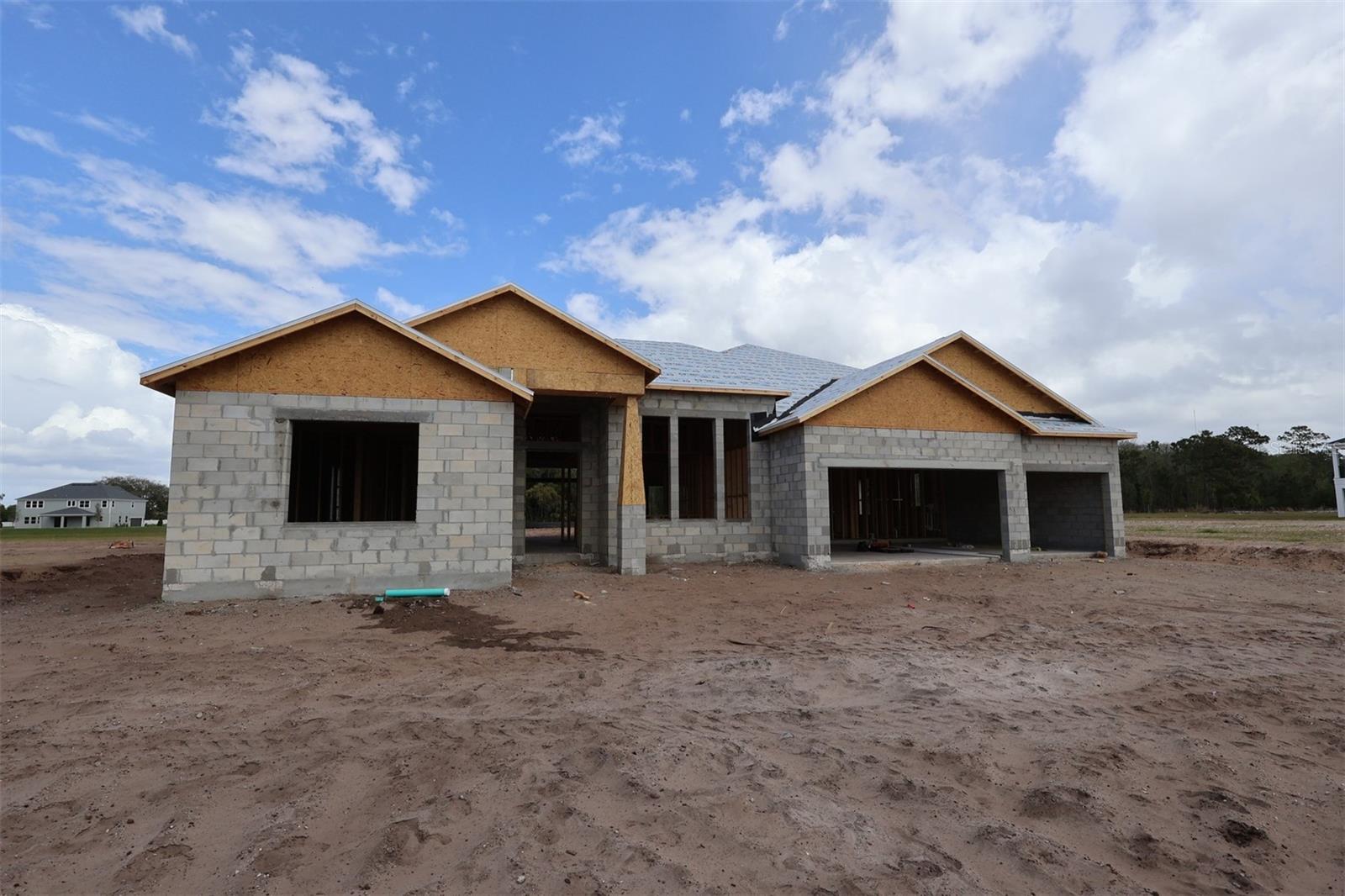 Under Construction. Discover this stunning new construction home at 3053 Solace Way Orlando, built by M/I Homes. This impressive 5-bedroom, 4.5-bathroom home spans 4,530 square feet and features thoughtfully designed living spaces perfect for modern family life.The home showcases quality design elements throughout, with attention to detail evident in every room. The open-concept floorplan creates seamless flow between living areas, while the generous square footage provides ample space for comfortable living and entertaining.The kitchen is sure to impress with its 42-inch cabinets, oversized island, walk-in pantry, and separate breakfast area with panoramic views of the backyard. The family room and extended rear lanai are showstoppers as well.The main living areas separate the bedrooms—all of which have walk-in closets—for extra privacy. Your owner's suite features a tray ceiling, a spa-inspired en-suite bathroom, and two walk-in closets.A massive bonus room with hardwood floors, as well as a bedroom and full bath, are on the second floor to provide you with even more space and flexibility for family and guests. This new construction home is an exceptional opportunity to own a beautifully designed residence in one of Orlando's sought-after neighborhoods. Contact us today for more details!