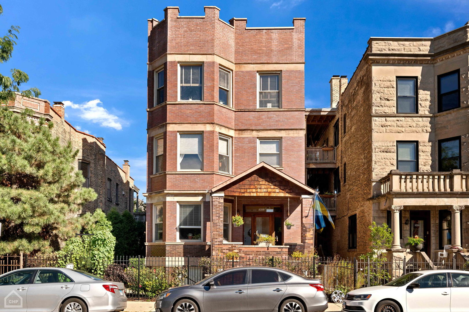 ***MULTIPLE OFFERS RECEIVED. HIGHEST AND BEST CALLED FOR BY MONDAY, JUNE 29TH @ 12 NOON.*** Bright and spacious vintage 2BR/2BA condo in hot Logan Square! This is not like most other flat-style units around the city. The gleaming hardwood floors throughout, tall windows, exposed brick walls, and sunny western exposure make this home a true one-of-a-kind knockout that totally "passes the vibe check." The open living/dining space flows perfectly for entertaining and enjoying the cross breezes throughout on a chill day. Off the living room is an office nook with a gas fireplace and built-in bookcases--perfect for a Zoom backdrop and a place for pets to sit at your feet while working from home. The primary bedroom can comfortably fit a king size bed, and features an en suite full bath. Down the hall is a generously sized second bedroom and bath, and in-unit laundry closet! For those who love the privacy of working in a closed kitchen will love the layout of this space--two walls of cabinet storage, stainless steel appliances (including a Wolf range), and an island for additional counter and prep space. Just off the kitchen is a deck space large enough for a small table and chairs and gets enough light for plant lovers. This unit comes with 1 exterior parking space included in the price! Public transit is easy here--less than two blocks to the Logan Square Blue Line station (enter at Milwaukee and Spaulding), and a plethora of buses on Kimball, Diversey or Milwaukee Avenues. Top notch retail, dining and nightlife options on nearby Logan Boulevard or Milwaukee Avenue like Lula Cafe, The Duplex, La Boulangerie and more!