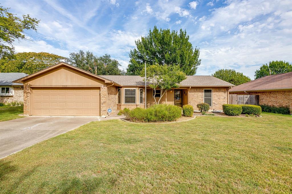 Charming Benbrook Ranch! This 3-bedroom, 2-bath home offers 1,448 square feet of inviting living space. Lovingly maintained and move-in ready, it features a kitchen with granite countertops and updated stainless-steel appliances. The large living room is highlighted by a vaulted ceiling with an exposed beam ceiling, and the wood-burning fireplace, creates a warm, welcoming atmosphere. The dining area flows seamlessly into the living space—perfect for gatherings with friends and family. The primary suite includes an oversized ensuite bathroom with an updated shower, separate soaking tub, 2 walk-in closets, and a dual-sink vanity. Split from the primary, the additional bedrooms share an updated full bath. Just off the living room is a private sunroom, complete with a pet door for convenient indoor and outdoor access. The sunroom opens to a tree-shaded backyard, ideal for quiet mornings. The back patio offers a covered area for your outdoor grill or smoker, plus a designated space with a hook-up for a hot tub. A storage shed provides room for landscaping equipment, extra storage, and DIY projects. Come see for yourself why this well-cared-for home is a true Benbrook gem!