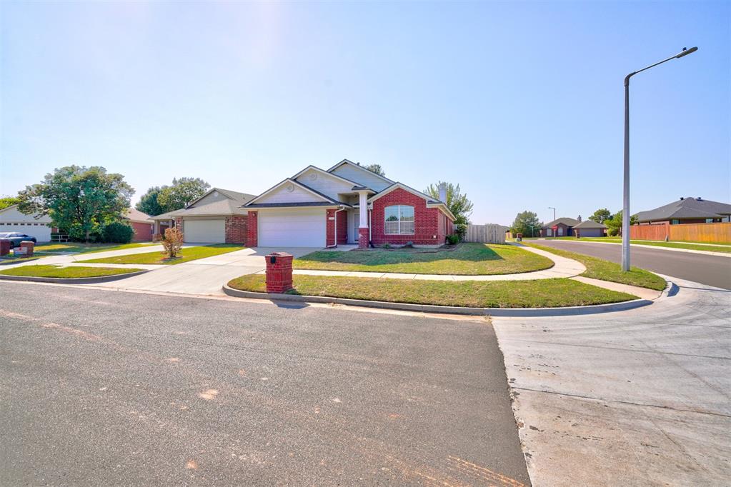 Welcome to this fantastic four-bedroom, two-bathroom home situated on an oversized corner lot located in the highly desirable Moore School District! This property boasts an open living room with a flexible second living space, providing the perfect layout to meet all your needs. Recently updated, the home features a new roof, fresh paint, luxury vinyl plank flooring and new carpet. The primary living room offers a cozy ambiance with a brick gas log fireplace, partially open to both the second living area and the galley kitchen, making it great for entertaining. The spacious primary bedroom comes with an en suite that includes double sinks, a soaker tub, a separate shower, and a generous walk-in closet. The secondary bedrooms are also spacious, each offering ample storage space. This home is perfect for those looking for comfort, style, and functionality in a prime location. Don’t miss out on this amazing opportunity! Welcome Home!