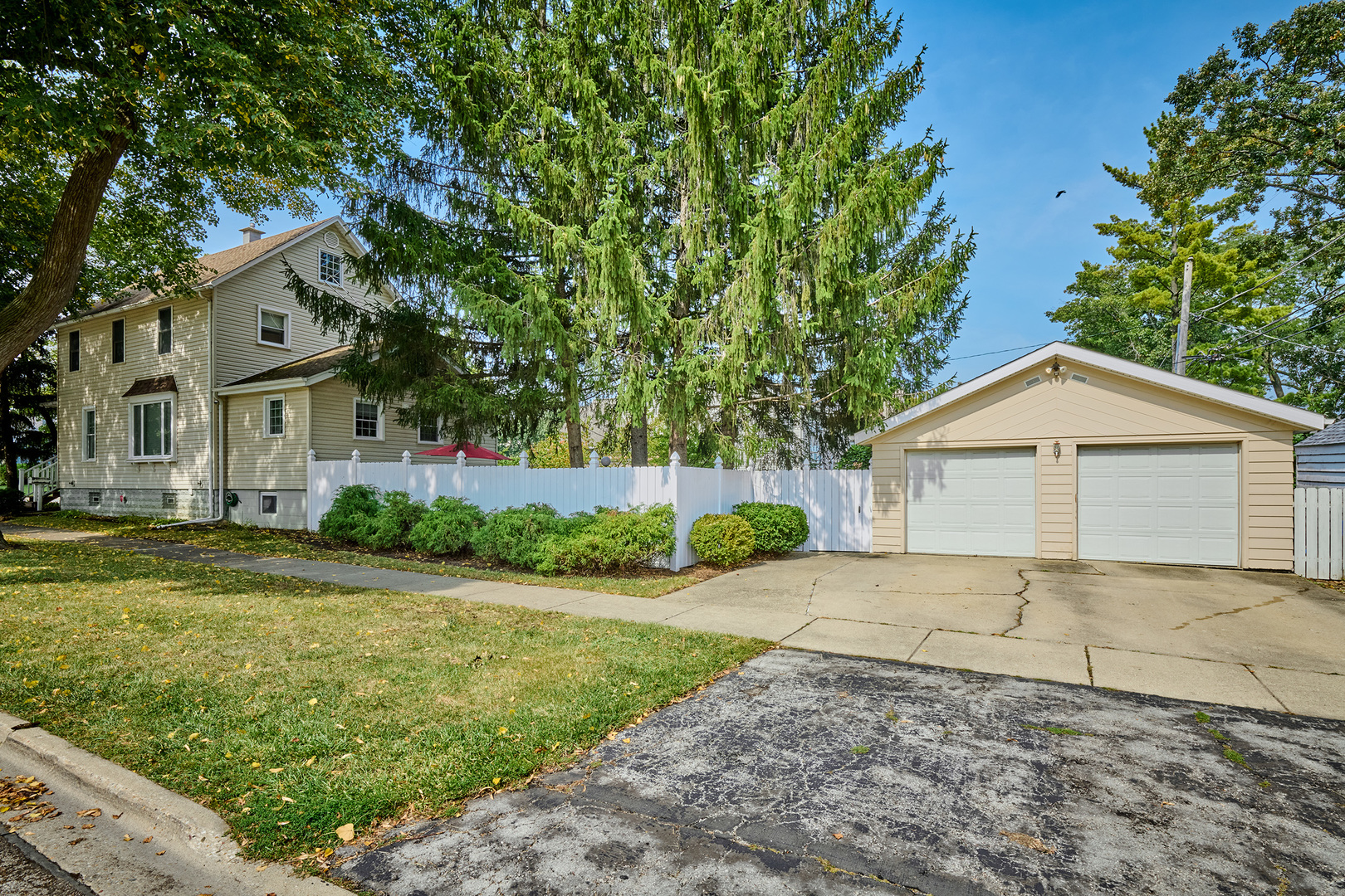 A Home with Exceptional Space in Downtown Arlington Heights!  Discover this incredible opportunity just a short walk from downtown Arlington Heights. With a spacious five bedrooms and 2.5 baths, this home provides a unique and generous amount of living space for a growing family or those who love to entertain.  The first floor features a convenient bedroom and a full bathroom, offering an ideal layout for guests or multigenerational living.Upstairs, you'll find three more bedrooms, with a shared master bath.A finished basement adds valuable extra space with a fifth bedroom and a half bath, perfect for a home office, recreation room, or private suite.  The open attic space presents an excellent opportunity for additional storage or future customization.  Step outside to a private, fenced backyard complete with a lovely brick paver patio, providing a perfect backdrop for outdoor gatherings. A two-car detached garage is easily accessed from the private Hawthorne entrance.  This home's prime location is its key highlight, placing you within walking distance of the Metra train station, local schools, and all the vibrant shops and restaurants of downtown Arlington Heights. This is a rare find with great potential in a highly sought-after area.