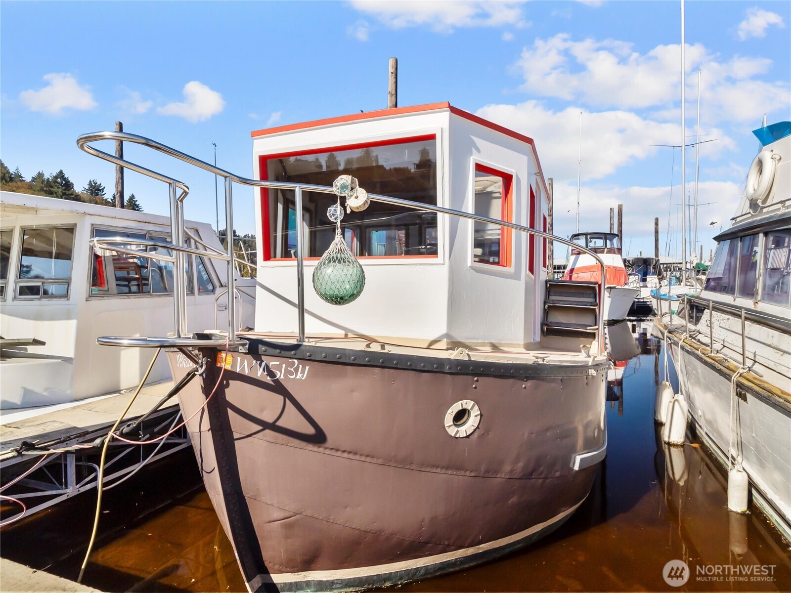 Welcome to this one of a kind 1940 Naval trawler conversion. Enjoy a piece of history surrounded by beautiful views of the capital, bay and nearby wildlife. Located in Olympia's West Bay Marina, this 1 bed 1 bath live-aboard boat would make a fantastic short term rental or a great place to escape for a couple nights! Tugboat Annie's is only steps away, and Oly's waterfront Farmers market and downtown only minutes away- you can't beat this location! Updated exterior paint, new LVP flooring when you first enter the cabin, nice size living space with walk-in pantry/closet. Bask in beautiful sunny days on the topside watching marine life float by. Boat can also be relocated!