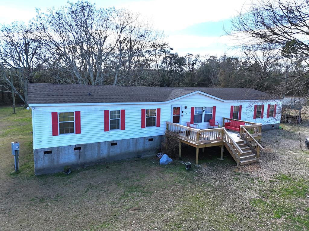 Great mobile home on 1.33 acres in Thomas County. This 4BR/2Bath home has wonderful open space, nice kitchen, fireside living room and den. Primary bedroom is HUGE with its own bathroom and walk-in closet. Call your favorite agent TODAY for a closer look.