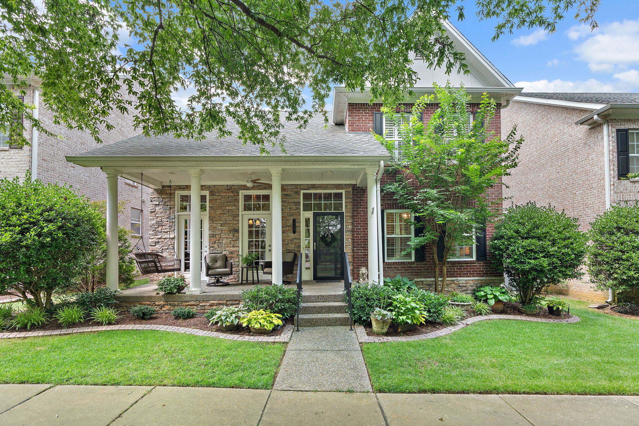 This beautiful all-brick home in Moore’s Landing blends comfort, convenience, and scenic charm. Featuring 3 bedrooms, 2.5 bathrooms, a spacious two-car garage, and a brand-new roof installed this year, this home is move-in ready with thoughtful upgrades throughout, including ALL NEW appliances, and a butler's pantry. Beautifully landscaped by a master gardener, the yard offers both beauty and low-maintenance appeal. Located just steps from sidewalk-lined streets, a neighborhood playground, and a scenic “Schoolpath” that leads directly to Moore's Elementary. All of this, just minutes to Historic Downtown Franklin and a quick 20-minute drive to Cool Springs Galleria, and is convenient to dining, shopping, and everything else you love.
