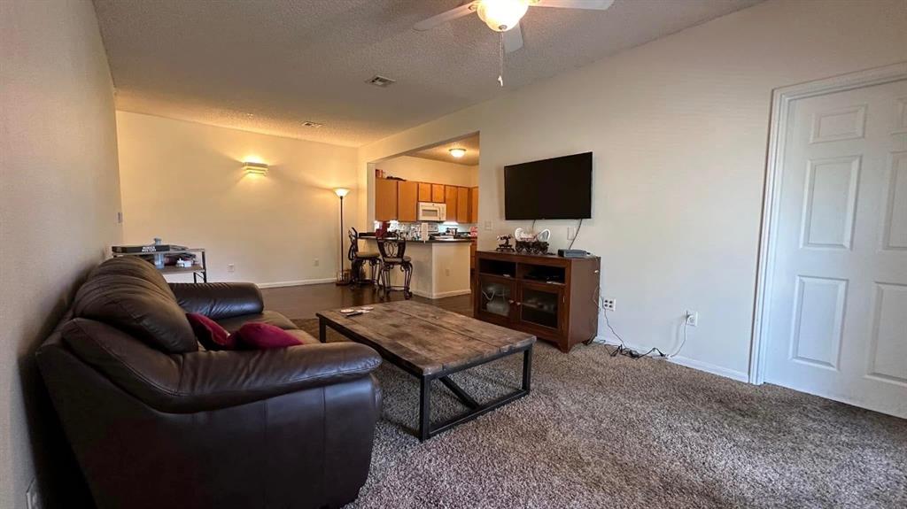 **Multiple offers received.  Please submit highest and best bids by 6 pm Monday 4/13 with a response time of at least 9 pm the same day.**Investor’s Dream: Fully Leased Condo on the Ground Floor with Guaranteed Income Stream through Summer 2027!This 4-bedroom, 4-bathroom condo in the coveted Edge community presents an exceptional opportunity for savvy investors looking for a hassle-free, income-generating asset. With a fully leased unit and three of four tenants already committed through summer 2027, this property offers a reliable, long-term revenue stream with minimal turnover risk.Each bedroom in this spacious unit is a private suite, complete with a walk-in closet, bed frame, desk, night stand, tv stand, and full bathroom, ensuring high demand from students or professionals seeking quality, independent living. The condo’s open-concept living, dining, and kitchen areas provide ample space for tenants to unwind, while the fully furnished setup—including a couch, TV, dining table, and modern appliances—means zero additional expenses for a new owner.The unit also features a covered balcony, offering tenants a peaceful retreat, while residents of The Edge enjoy exclusive access to premium amenities like a fitness center, swimming pool, spa, and sports courts.With its prime location just one mile from the University of Oklahoma, this condo consistently attracts tenants seeking proximity to campus. The property is not just a place to live—it’s a lifestyle choice that appeals to those looking for convenience and community.For investors, this property represents a turn-key solution—fully rented, professionally managed, and with leases in place until summer 2027. With the potential for solid returns and minimal upkeep, it’s a fantastic way to secure a steady, predictable income stream for years to come.