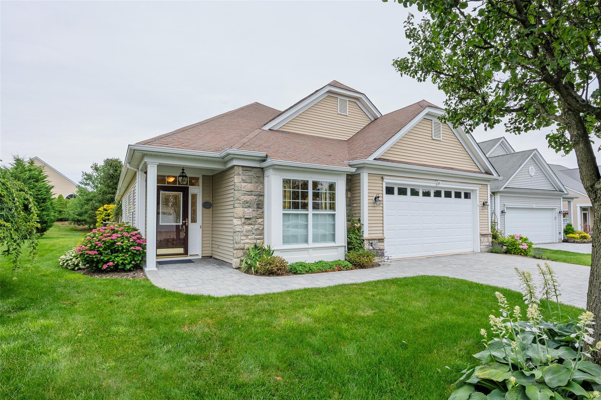 Located on a Cul-De-Sac in this much desired, double gated, 55+ community, this beautifully decorated Claremont model offers a unique blend of Pulte design and workmanship along with elegant upgrades. Whether hosting for the holidays or weekend guests, an open floor plan will impress all who enter. An updated eat-in-kitchen with both butcher block and quartz countertops provide both aesthetics and functionality. Walk through the living room to a spacious sun-room and onto a beautiful patio with a park like setting. Pocket doors in the sun-room allow for privacy when needed. A huge primary suite with tray ceilings, a large walk-in closet along with a spacious updated primary bath add to the elegance of the home. The guest quarters include a large bedroom with full bath. A formal dining area is multi-purposed for an office or music room. This home features a private den and sitting area, a separate laundry room, utility room, gas fireplace and a two-car attached garage with ample storage. Natural Gas heating, Central Air, Central Vacuum, updated appliances and updated hot water heater add to the maintenance free living. This home is a short distance to the clubhouse which offers numerous amenities including outdoor pool, bocce and tennis courts, indoor pool and hot tub, gym, card and meeting rooms. DON'T MISS THIS ONE!!
