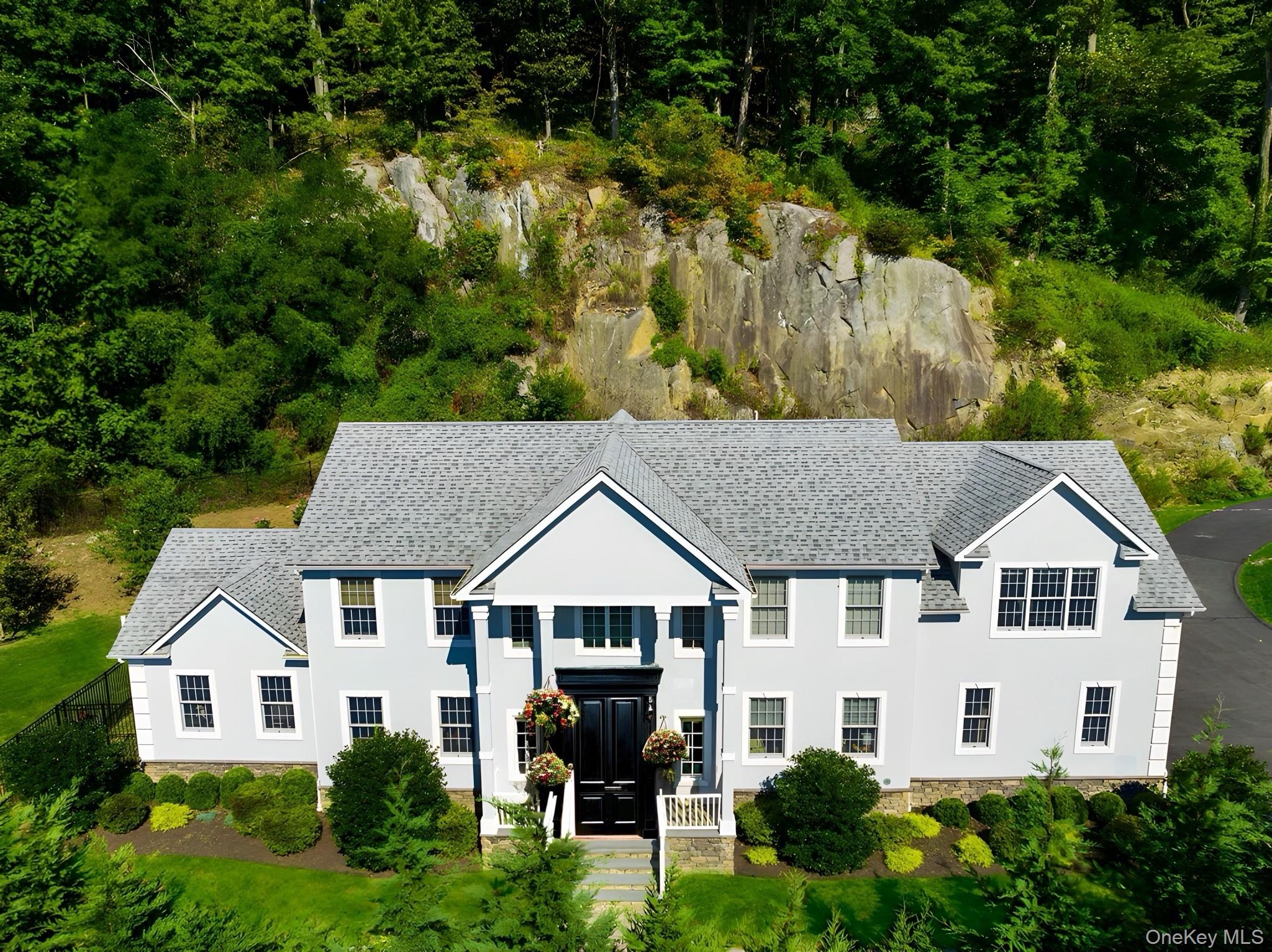 This sophisticated four-bedroom residence offers an ideal blend of convenience and tranquility just north of New York City. Enjoy the ease of walking to the vibrant village of Chappaqua—with its boutiques, caf&#233;s, and train station—while benefiting from the highly regarded Pleasantville School District. Commuting is effortless with the Chappaqua station mere minutes away and seamless access to the Saw Mill Parkway. An evening on Broadway is just a train ride away, with the serenity of home awaiting your return.
The home’s thoughtful layout begins with a welcoming entry that flows into a beautifully renovated kitchen, where a center island anchors the space. Designed with a nod to California bungalow charm yet updated with modern finishes, it sets the tone for comfortable, stylish living. At the rear of the home, a luminous family room with vaulted ceilings provides an airy, sunlit retreat, ideal for both relaxation and entertaining.
Upstairs, four generously proportioned bedrooms offer privacy and comfort. The principal suite, discreetly positioned in its own wing, affords a peaceful escape from the bustle of daily life, while the remaining bedrooms accommodate family or guests with ease. Beyond the interiors, a private, low-maintenance backyard extends the living space outdoors.
With its prime location, modern updates, and seamless lifestyle, this residence presents a rare opportunity to step effortlessly into Westchester living. Full bus service to Pleasantville schools further enhances its appeal.