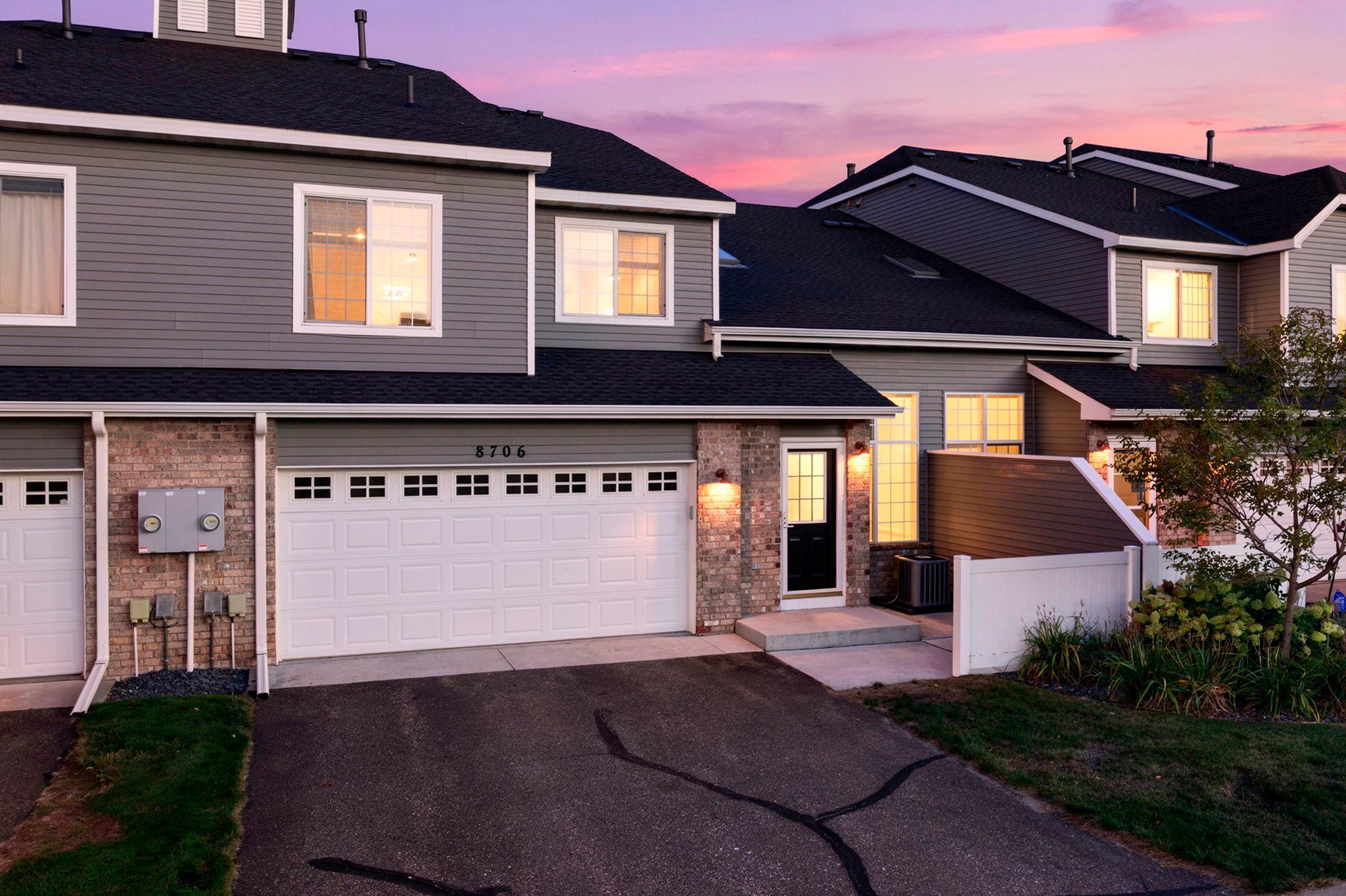 Welcome to this charming, well-maintained townhome nestled in a quiet Blaine neighborhood. Offering numerous updates for added peace of mind, this home features a new HVAC system (2023), newer water softener, water treatment system (2021), water heater (2020), and walk-in bathtub (2020). Additional updates include new main-level carpeting (2026), all-new kitchen appliances (2026), and fresh paint throughout. The siding & roof was also replaced within the last few years by the HOA. As you enter, the spacious living room welcomes you with impressive 18-foot vaulted ceilings, a skylight, and a large front-facing picture window that fills the space with natural light. Brand-new carpeting adds a fresh feel to the main level. The kitchen features ample wood cabinetry, new stainless steel appliances, a pantry, additional storage, and convenient access to the half bath and attached two-car garage, which also provides access to a large crawl space for added storage. The kitchen flows into the dining room, highlighted by wainscoting, new carpeting, and a classic chandelier.The upper level features two bedrooms, including a spacious primary bedroom with carpeting, ceiling fan, large window, and an impressive 8x7 walk-in closet. Bedroom two also offers carpeting, ample closet space, and a front-facing window. Both bedrooms are conveniently located near the full bathroom, which features a walk-in bathtub (2020), separate walk-in shower, large single vanity, and access to the well-appointed laundry room. A spacious loft provides flexible living space for a home office, sitting area, or additional gathering space and features carpeting, closet space, and a railing overlooking the living room below. Don’t miss the opportunity to make this charming townhome your own, conveniently located near shopping, dining, and local amenities in Blaine!