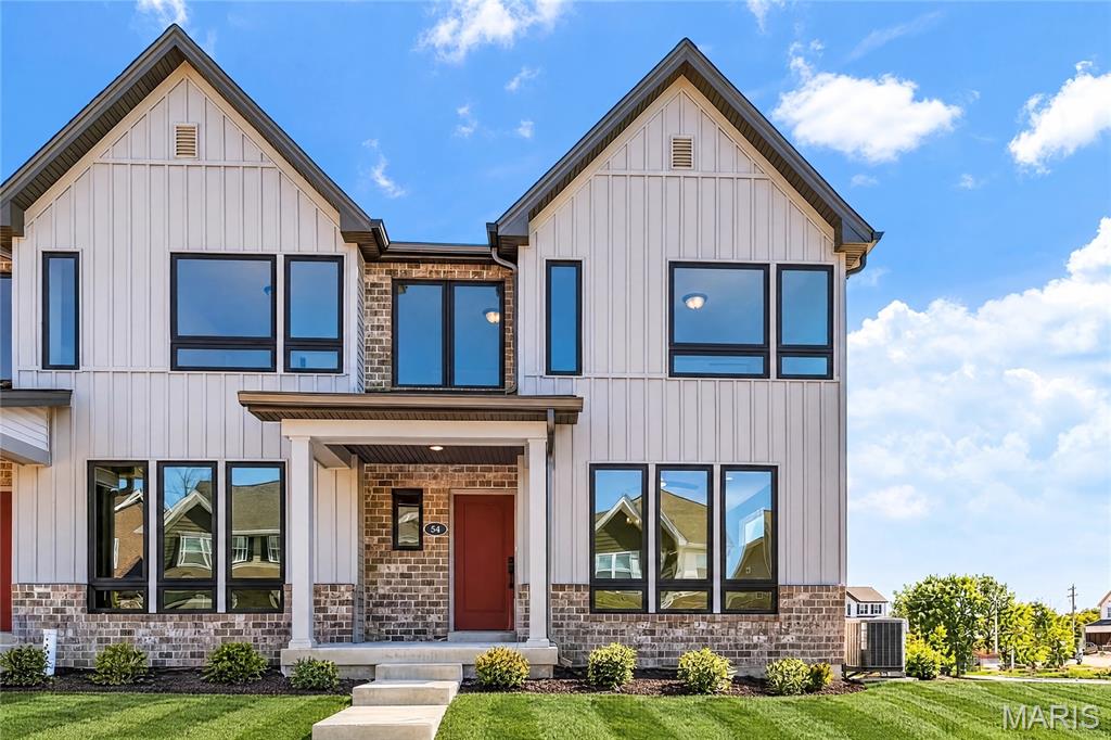 Move In Ready!  New construction, luxury townhome by Fischer and Frichtel in a fantastic St. Peters location. This 3 bedroom, 2.5 bath, 1,474 sq ft, end unit, townhome has an attached, oversized, rear entry 2 car garage and a full basement with bath rough-in.  The curb appeal is excellent with brick, board and batten siding, enlarged casement windows with modern grid design, architectural roof shingles, professional landscape and lawn irrigation. Features include 9 foot ceilings on the main floor, wood laminate flooring on the main floor, an open floor plan, main floor Powder Room, 42 inch white shaker style cabinets with crown, soft close feature, roll out shelving, walk in pantry, contrast island with seating bar, quartz countertops, stainless steel appliances, electric stove, microwave, dishwasher, large Primary suite with walk in closet, double bowl vanity in the Primary Bath, comfort height commode, luxury vinyl tile flooring, semi frameless shower door, convenient second floor Laundry Room, generous sized secondary bedrooms, Low E windows, R 38 ceiling insulation, custom wall color, belt driven garage door opener, Pure Shield insect control system and more. This is an all-electric home. Residents of Birdie Hills Crossing Townhomes will be served by the Ft Zumwalt School District. Located near the corner of Mexico Rd and Birdie Hills/Salt Lick Rd, residents have easy access to Hwy I-70, shopping, restaurants, parks and exceptional recreation areas.