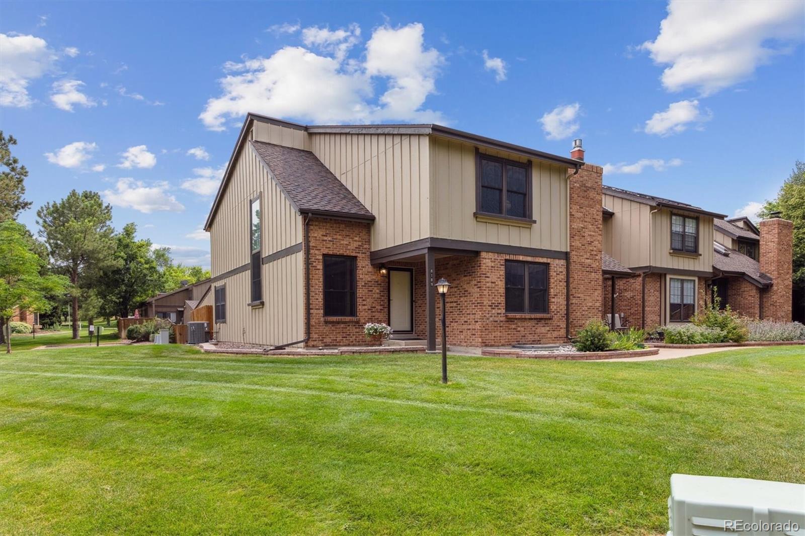 RARE opportunity to own an END-UNIT townhome in Willow Creek, perfectly situated next to the creek, greenbelts and walking path! These special units seldom hit the market—especially in such a prime location just steps from the park, pool, tennis and pickleball courts, trails, and playground.
This spacious 4-bedroom, 4-bath home is filled with natural light, thanks to additional windows in the family and dining rooms—one of the many perks of being an end unit. The main floor offers great flexibility with a bedroom and 3/4 bath, ideal for guests, multi-generational living, or a home office. You’ll love the brand new LVP flooring (2024), remodeled kitchen with generous pantry, and the cozy double-sided fireplace connecting the living and dining areas. A modern stair railing was recently installed, adding a stylish touch to the home.
Step outside to enjoy the extended deck—perfect for morning coffee or relaxing evenings. Upstairs, the primary suite features its own fireplace, and both the upper level and basement have new carpet (2024). Popcorn ceilings have been removed throughout, and the interior has been freshly painted. Upstairs you will find another bedroom with attached 3/4 bath. 
The finished basement includes a spacious living area, additional bedroom and 3/4 bath, plus a large laundry and storage room with tiled flooring. Other updates include a new front door (2025) and furnace and A/C system installed within last 3 years.
This thoughtfully updated, low-maintenance home offers comfort, space, and an unbeatable location in one of South Metro Denver’s most desirable communities. Willow Creek is home to the award-winning Blue Ribbon Willow Creek Elementary and is part of the acclaimed Cherry Creek School District. The neighborhood hosts events like a Garden Tour, Easter Egg Hunt, Food Trucks, Movie Nights, Doggie Swim, Home Tour, Santa Day, and more. Close to Park Meadows Mall, grocery stores, restaurants, and shopping—with easy access to I-25 and C-470.