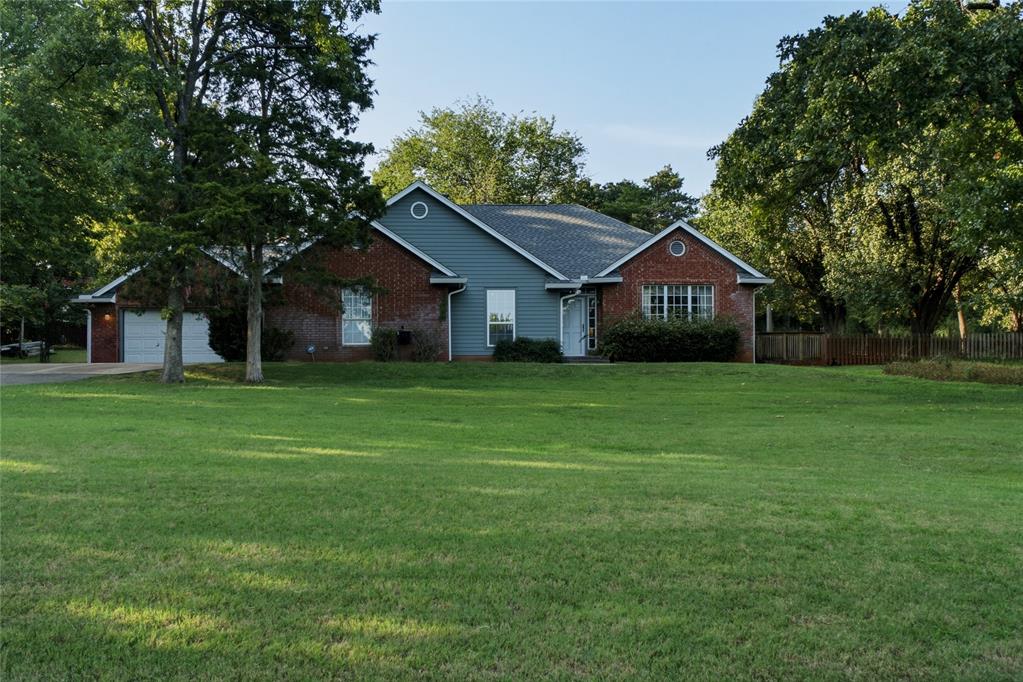 Location, location, location! Welcome to this wooded one-acre property tucked into a beautiful Edmond neighborhood with no HOA! This spacious 4-bedroom, 3-bath home offers an incredible opportunity for an owner-occupant ready to create a home that reflects their style or an investor looking for their next renovation project. The large living room and kitchen overlook the peaceful property, while the outbuilding, equipped with electricity, provides additional storage, workshop space, or other possibilities. The primary bathroom has already been gutted and is ready for a complete transformation. Major updates include a new roof(2025) and Furnace( 2024). Newer appliances and a deep farm sink make cooking and entertaining more enjoyable. With a scenic setting, generous space, and endless potential, this property is ready for its next chapter.