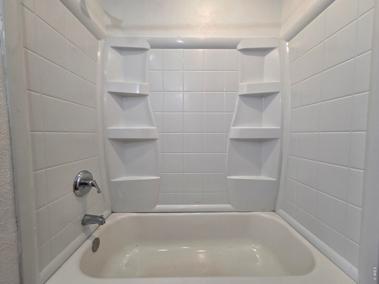 NEW PRICE! Reduced to Sell! Wonderful opportunity to own a home in Estes Park. Main Level Living, no stairs once inside! Offering 3 bedrooms and a unique configuration for the bathroom, with a vanity, toilet, shower/tub combo and a stall shower in one! Connected to the primary bedroom for easy access, but accessible for all 3 bedrooms. Larger fenced back yard for privacy with 2 metal sheds for the outdoor items or extra storage. Fencing has a double gate from the front parking to the back yard for easy access for your trailer, toys, RV or projects. Unfinished lower portion of the home provides more storage and access to plumbing under the home. Schedule a showing today!