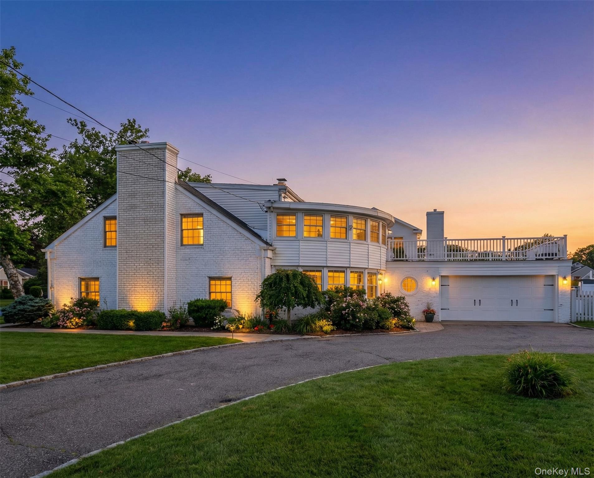 Wake up every morning to canal views and the quiet rhythm of waterfront living — this is the lifestyle waiting for you at 1 Central Avenue in the heart of Amityville Village. Set canal-front with direct water access and a boat slip, this character-rich Cape Cod offers one of the most coveted waterfront experiences on the South Shore of Long Island. Whether you're dreaming of a home where you can step off your dock and onto the water, or simply sip your morning coffee watching the canal from your rooftop deck, this property delivers that and so much more.Built in 1949 and full of original charm, the home spans 2,186 square feet across two levels and greets you with the kind of architectural details that simply can't be replicated — exposed beams, original stone floors with radiant heat, French doors, elegant archways, crown molding, and built-ins surrounding a wood-burning fireplace in the sunken living room. A second fireplace in the primary bedroom adds warmth and intimacy to a suite that also features two closets, a bonus room perfect as a dressing room or walk-in, and private access to a brand new rooftop deck with Trex decking overlooking the canal. The updated upstairs bathroom is a true retreat, featuring a stunning steam shower. Hardwood floors, granite counters, an eat-in kitchen, and formal dining room round out an interior that balances timeless character with everyday comfort.Beyond your own private waterfront oasis, the location is truly special. Amityville Village is a beloved South Shore community known for its charming downtown, dining, boutique shops, local breweries, and a vibrant year-round social scene — all just moments from your door. Commuters will appreciate the easy access to the Long Island Rail Road, and outdoor enthusiasts will love being minutes from Great South Bay, local marinas, and the best boating the South Shore has to offer. This is the kind of home and lifestyle people search for years — a rare opportunity to own a piece of waterfront Amityville with all the village amenities to match.