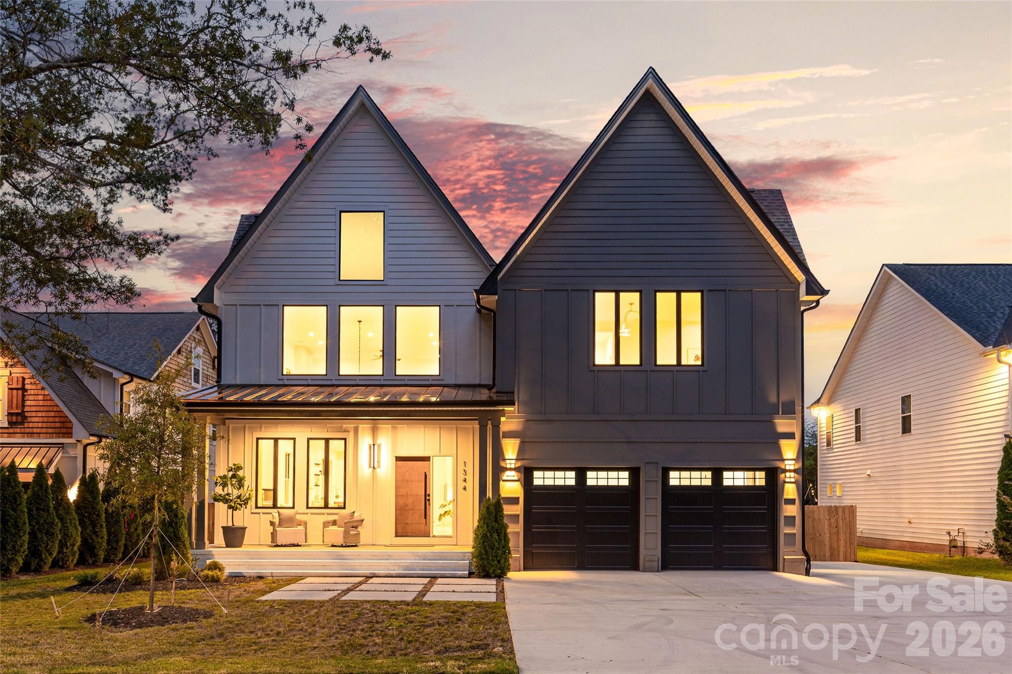 Welcome HOME! This beautiful new construction home is filled with light and is sure to wow from the moment you step inside! In the popular Cotswold area of Charlotte, upon entering this home you’re greeted by a dramatic two-story open living space that is sure to wow. The living space seamlessly flows into a sleek, contemporary kitchen—perfect for both everyday living and entertaining. The chef’s kitchen is a true centerpiece, featuring elegant quartz countertops, a show-stopping waterfall island, gas range, and a full suite of stainless steel appliances. The open layout creates an effortless connection between the kitchen, dining, and living areas. It's the perfect spot to gather while hosting others or enjoying family meals. With 5 spacious bedrooms and 4.5 beautifully appointed bathrooms, this home offers flexibility for guests, home offices, or multi-generational living. The primary suite is a private retreat, complete with a spa-inspired bathroom boasting a zero-entry walk-in shower, a luxurious soaking tub, and generous space to unwind. The downstairs guest suite is well-appointed and could also serve as a primary suite. Step outside to enjoy a large, fully fenced backyard—ideal for gatherings, pets, or play. A spacious deck overlooks the yard, offering the perfect setting for outdoor dining, morning coffee, or evening relaxation. This home has light filled spaces in every room and finishes that the most discerning buyers are looking for from custom closets to showers with zero-entry and frameless glass, tankless water heater, fully fenced yard, high ceilings and a loft space overlooking the main living area that has a stunning glass railing. This is a fantastic opportunity to get into the booming Cotswold / "Oakwold" area, where many new builds are priced well-above this!