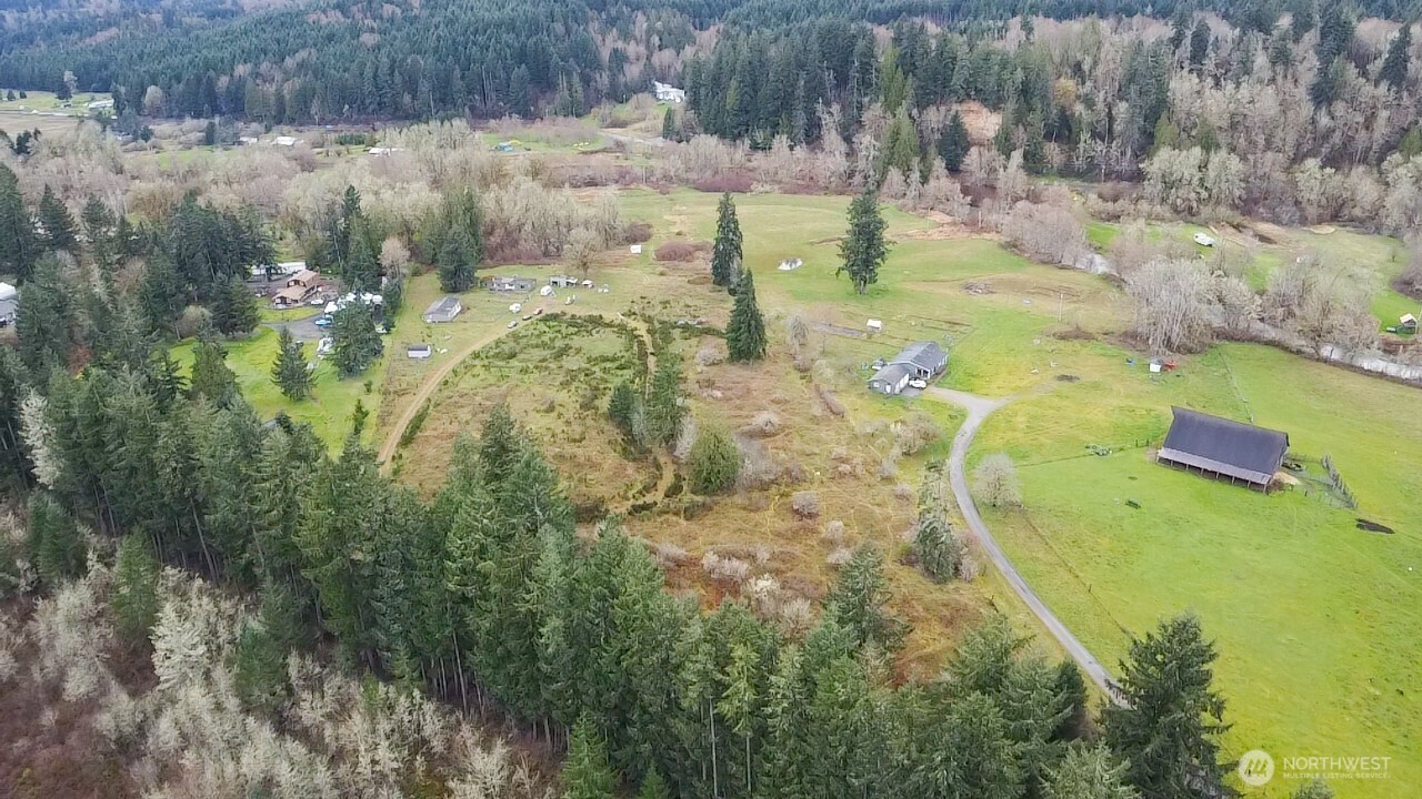 Escape to the Skookumchuck Valley with this secluded riverfront acreage. Surrounded by nature and accessed by a private drive, the property offers a peaceful setting with outstanding potential. Restore the existing home or build the dream home you've always envisioned. Plenty of space, privacy, and riverfront beauty. Property is sold as-is with contents included.