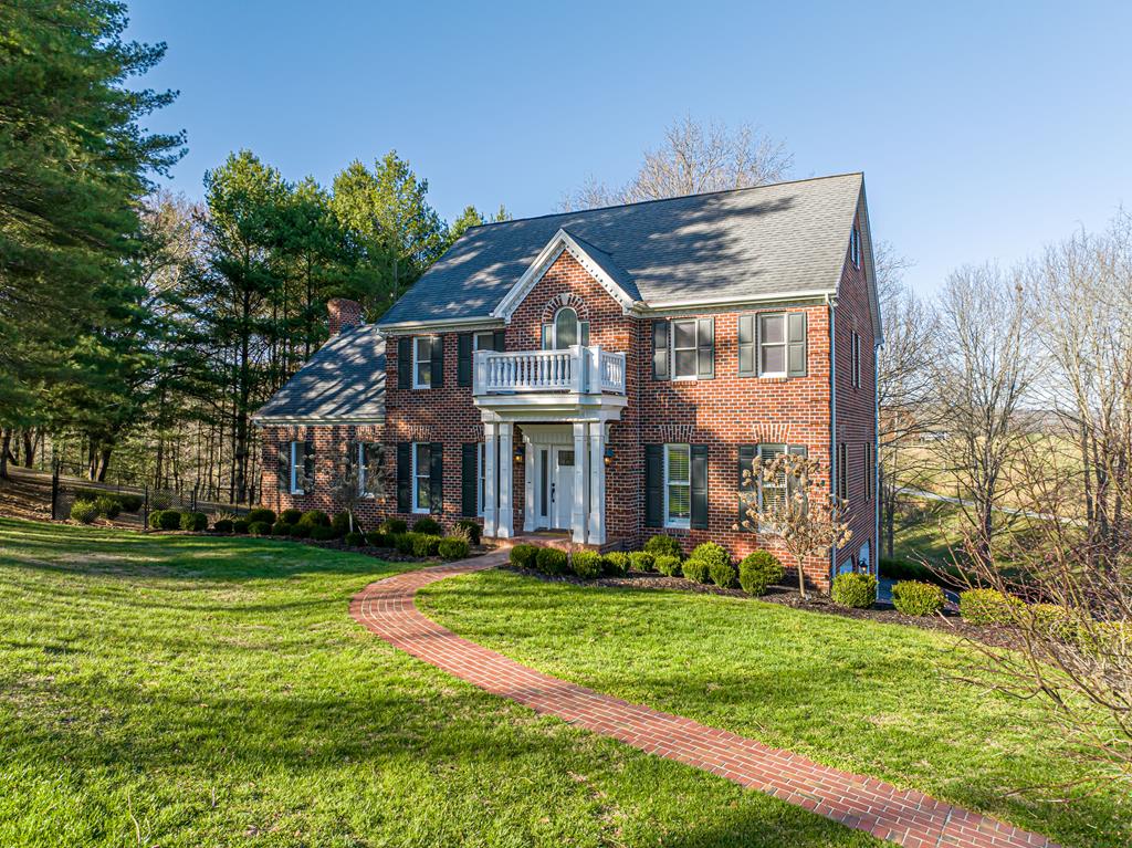 Welcome to a home where timeless design meets elevated living. Offering 5 bedrooms, 3 full baths, and 1 half bath, this residence is thoughtfully designed for those who value both sophistication and comfort. From the moment you enter, the grand staircase and refined architectural details set the tone, classic, intentional, and effortlessly elegant. The layout offers both formal and relaxed living spaces, ideal for entertaining, working from home, or simply enjoying a slower pace at the end of a long day. At the heart of the home, the state-of-the-art kitchen is a true statement. Featuring high-end appliances, custom cabinetry, and an expansive island, it's designed for both function and presence, equally suited for quiet mornings or hosting with ease. The primary suite and additional bedrooms provide generous space and privacy, while the spa-inspired bathroom offers a retreat-like experience with elevated finishes and a sense of calm. A standout and rare feature, the dedicated dog washing station, adds a level of thoughtful convenience for pet owners who appreciate both practicality and care. Every detail of this home reflects quality, intention, and a standard of living that feels both elevated and grounded. Additional stand out features include cedar closets and a full outdoor kitchen creating a seamless blend of refined interior detail and exceptional outdoor living. All information is deemed reliable but not guaranteed. Buyer and Buyers agent to verify all information.