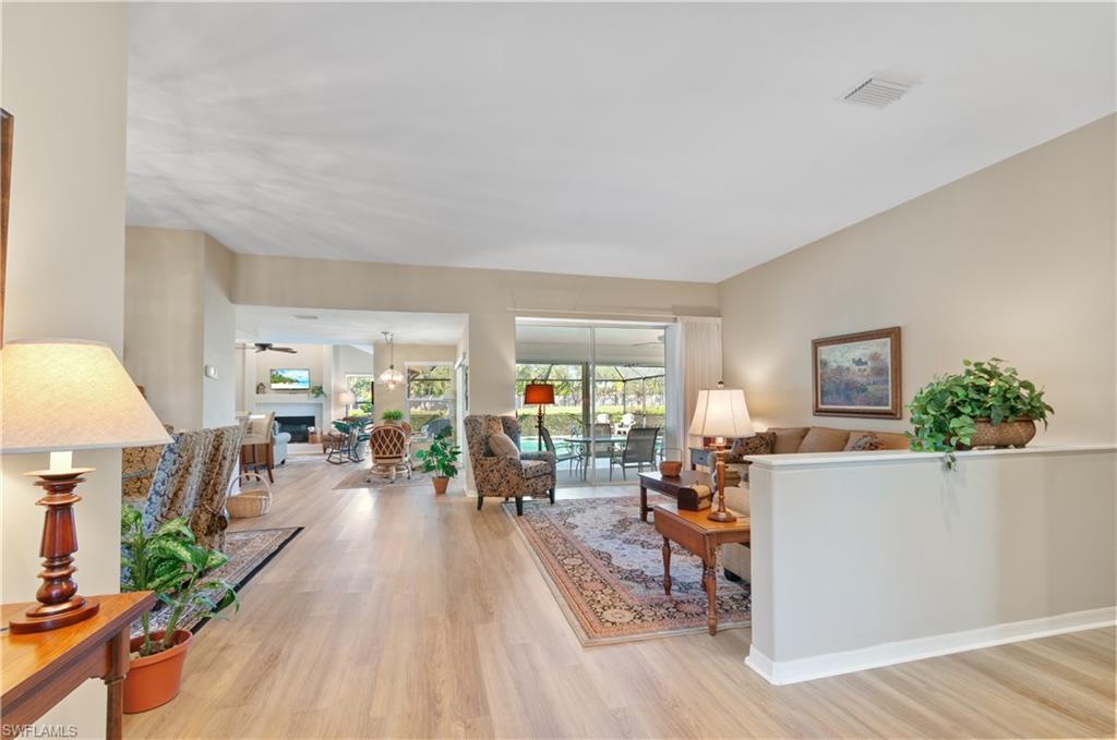 MOVE IN READY: If you're in the market for a spacious and luxurious residence, this stunning home in the prestigious Worthington community is an ideal choice. Boasting 3 bedrooms, 2.5 bathrooms, versatile den, a two car garage, and offers 2,336 square feet of elegant living space. Enjoy breathtaking views of the serene lake and manicured golf course from multiple vantage points throughout the property.This move-in-ready home is thoughtfully designed for both comfort and sophistication. Beautiful wood vinyl flooring graces the dining room, living room, and family room, while plush carpeting adds warmth to all bedrooms, and sleek tile flooring enhances the bathrooms. Abundant natural light floods the interior, creating a bright and inviting atmosphere.Step outside to the expansive screened-in lanai, complete with an in-ground pool—the perfect oasis for relaxation while soaking in the panoramic lake and golf course vistas.  Home is protected with hurricane shutters/window coverings, a new pool heater installed 2025 and AC installed 7/16/26.Live the Worthington Country Club LifestyleResidents enjoy a bundled golf membership in one of Southwest Florida’s most desirable private communities. Your HOA includes championship golf, an active clubhouse with dining, tennis, bocce and an exciting calendar of social events.Exciting Community Enhancements Coming SoonConstruction begins Spring 2026 on a spectacular new cabana featuring an indoor/outdoor bar area and a stylish pergola with operable and fixed louvers for shaded outdoor dining. Additional upgrades include five new tennis courts, four new pickleball courts, and an expanded parking lot.  Enjoy the freedom of bringing your own cart to navigate the community.Located in a prime Southwest Florida setting, this home is just minutes from the pristine beaches of Bonita Springs and Naples, upscale dining and shopping at Coconut Point and Mercato, and Southwest Florida International Airport (RSW). Best of all, there are no CDD fees.This is more than a condo — it’s your gateway to the Florida dream. Schedule your private showing today and discover why Worthington Country Club is “the place you want to be.”