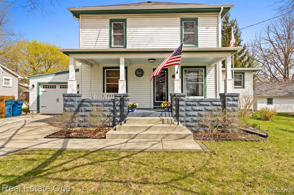 Step into this meticulously renovated 1900 two story colonial in the heart of Goodrich, where timeless craftmanship meets thoughtful modern design. The welcoming covered front porch opens to a bright formal living room and dining area. The main floor featuring an updated kitchen with stainless steel appliances. One carefully crafted home office, a second living room, and bedroom. The upstairs has three bedrooms, a full bath, and a laundry room. This charming house is located in the village of Goodrich walking distance to many local restaurants ( 411, Trios, Memaws diner), The Vine and Branch wellness spa, Salon 465, Lippys ice cream and Goodrich Country Club!