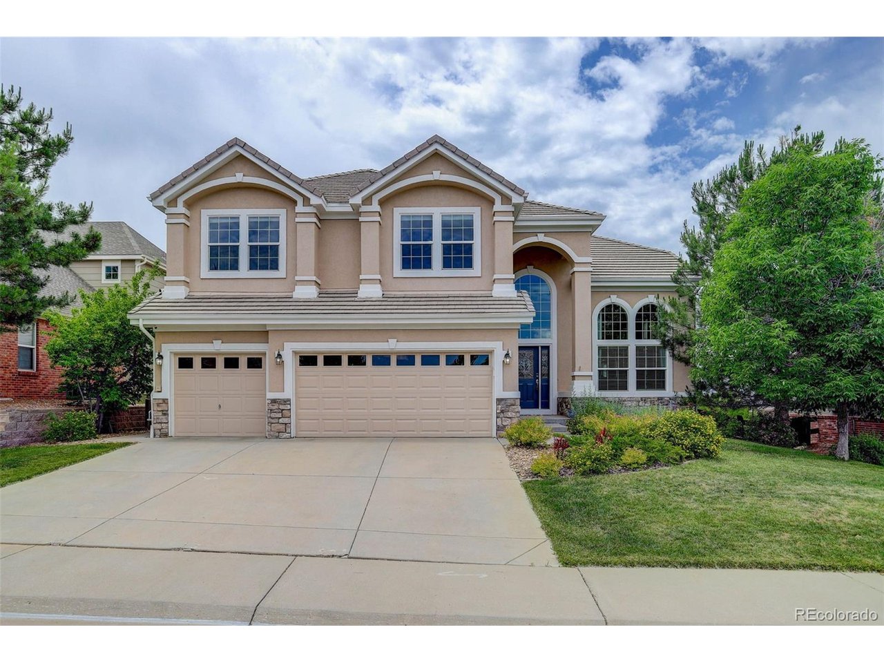 Backing to Black Bear's 13th Fairway with INCREDIBLE golf course, city and mountain views, this luxurious property exudes exceptional quality! Arched front door opens to spacious foyer with sweeping staircase for those grand entrances. Soaring ceilings coupled with walls of tall windows flood the rooms with natural light. Formal living & dining rooms with new LVP floors and custom built-in sideboard & lighted cabinets open to a cheery sunroom with direct access to the huge deck. Gourmet eat-in kitchen features striking granite countertops, large center island, stainless appliances, cherry cabinetry and access to 650 sq.ft. Trex deck. The centerpiece of the family room is a redesigned stacked stone fireplace wall and fireplace. Adjacent is a private office with custom built-ins. A powder room and laundry room complete the main level. Ascend the curving staircase to the primary bedroom suite with cozy fireplace. Relax in the spa-like 5 piece primary bath with jetted tub. The walk-in closet is the size of another bedroom with built-in his & her dressers. There are 3 additional spacious bedrooms and 2 additional baths on the upper level. BUT WAIT-THERE'S MORE! The finished walk out basement features a combined rec/TV room and game room with a wet bar and additional fireplace along with another bedroom & bath. Through the slider is a covered patio as large as the deck above. A large storage room includes shelving along the perimeter walls. More storage room in 3 car garage with extra cabinetry and ceiling racks. If you like to entertain, this property has the perfect flow through the main level out onto the fabulous deck.  Add to the incrediblle views, no neighbors directly behing or across the street in fron and you have the perfect elevated living experience!
