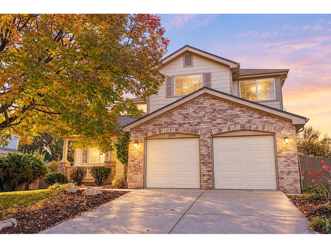 Backing to open space/farmland and a neighborhood trail, this beautifully positioned South Pointe home offers a rare combination of privacy, views and flexible living space. The light-filled main level features hardwood flooring and an inviting open layout designed for both everyday living and entertaining. A double-sided fireplace connects the family and dining areas, adding warmth and character throughout the heart of the home.The spacious kitchen offers a large center island, breakfast bar, butler's pantry, stainless steel appliances and an adjoining dining nook. A versatile bonus room located between the kitchen and garage provides the ideal space for a home office, playroom, craft room or additional living area.Upstairs, the private primary suite includes its own balcony overlooking the open space and surrounding landscape. Two additional bedrooms, a dedicated study and a generous loft provide ample flexibility for working from home, hosting guests or creating separate recreation space. The unfinished basement offers excellent storage and room for future expansion.Step outside to an expansive Trex deck with a soaring pergola overlooking the fully fenced yard, mature landscaping and raised garden beds. With no immediate rear neighbor, the outdoor space feels exceptionally private and peaceful.Located in the desirable South Pointe community, residents enjoy access to a neighborhood pool, parks and miles of nearby trails. The home is also conveniently positioned near Old Town Lafayette, Downtown Louisville, shopping, dining and major commuting routes to Boulder, Denver and surrounding communities.