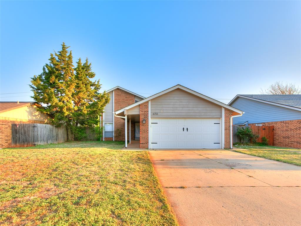 Open House Sunday April 12th from 2-4.  Great family home with beautiful, updated kitchen with island and SS appliances. Spectacular vaulted ceiling in the open living and dining areas. Great layout with two bedrooms downstairs & master suite upstairs.  Loft area at the top of the stairs would be great for a sitting area, office or gaming area.  Master bedroom has a private deck with beautiful views of the area.  Living room has a wet bar, glass sliding door to a large patio for all your grilling & outdoor activities for family & friends.  Location is close to NW Expressway, Lake Hefner & John Kilpatrick turnpike.  This is a must see!!