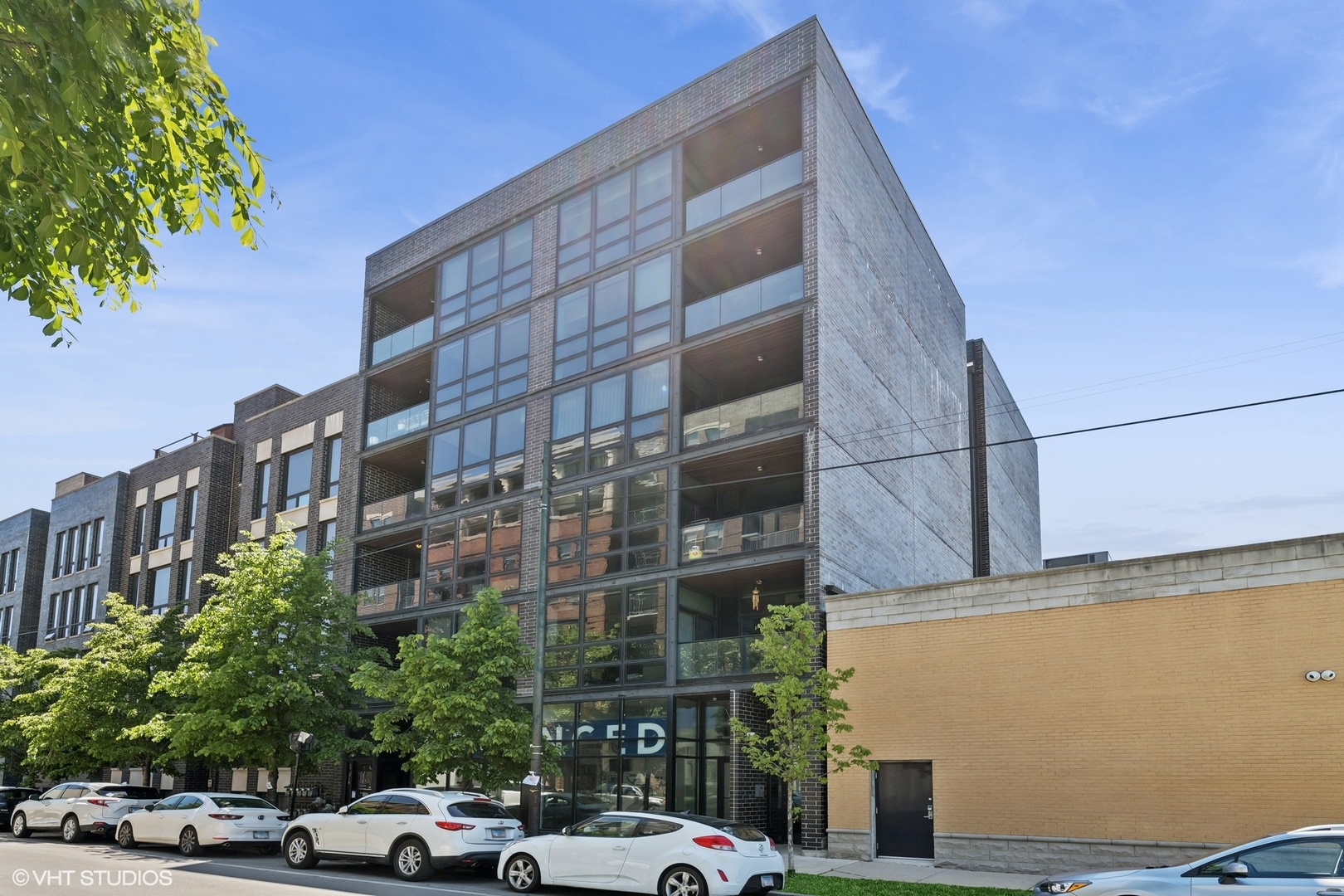 Stunning 3 bed/2 bath residence situated in a quiet pocket of River North in a like new, boutique 9-unit building. Step into this generously sized 1,887 sq ft unit through a private elevator entrance into your own secure foyer. Open floor plan features floor-to-ceiling windows and a luxury kitchen complete with Bosch appliances, Grohe fixtures, and undermount LED lighting. Conveniently placed east facing balcony off the dining room offers a perfect spot for a grill and private outdoor retreat. Sprawling primary suite offers two sizable walk-in closets and ensuite spa-like bathroom offering heated floors, oversized rainfall shower with body sprays, water closet and stand alone soaker tub. Guest bedroom equipped with built-in Murphy bed set up for a perfect guest + office space. Upgraded lighting fixtures and custom window treatments throughout. Common rooftop deck and 1 heated garage spot included in price. Available furnished as pictured, including artwork, for those looking for a truly turnkey space.