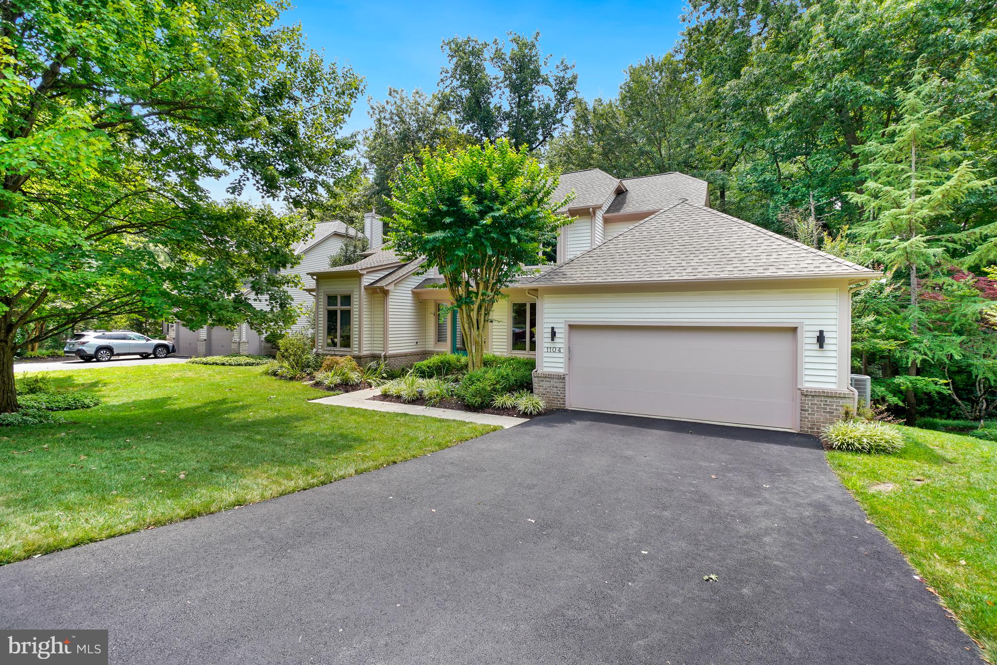 Nestled on a quiet cul-de-sac in the highly sought-after Water Pointe community of North Reston, this exceptional Gulick-built residence offers the perfect blend of elegance, comfort, and privacy. Situated on a beautifully landscaped 0.30-acre lot surrounded by mature trees, this home provides a peaceful retreat while remaining just minutes from Reston's premier amenities.Designed for both everyday living and entertaining, the home features approximately 3,500 square feet of thoughtfully designed living space with 4 bedrooms, 3½ bathrooms, soaring ceilings, expansive windows, and abundant natural light throughout. The highly desirable main-level primary suite serves as a private sanctuary with a spacious luxury bath and generous closet space.The gourmet kitchen opens seamlessly to inviting living and dining areas, while the dramatic family room showcases a fireplace and walls of windows overlooking the private backyard. The finished walk-out lower level provides flexible space for recreation, guests, or a home office and opens directly to the outdoor living areas.Outdoor amenities make this home truly special. A spacious deck overlooks the beautifully landscaped yard and private in-ground pool, creating an ideal setting for summer gatherings or quiet evenings surrounded by nature. The home's premier location within the neighborhood offers both tranquility and convenience.Residents enjoy easy access to Reston's extensive trail network, Lake Newport, North Point Village Center, Reston Town Center, Metro Silver Line stations, major commuter routes, shopping, dining, and top Fairfax County amenities. Updates include:  Heat Pump 2026, Furnace/AC 2025, Roof 2021, Water Heater 2023, Bosch Refrigerator 2022, Pool Pump 2025, Pool Heater 2024, Living Room Windows 2024, Motorized, remote controlled shades on lower level 2024, Lighting in basement and living room dimmable and remote control 2021.