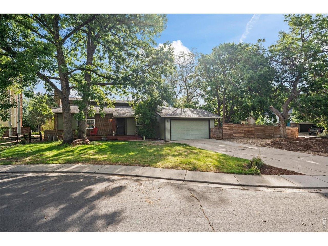MOTIVATED SELLER! MOVE-IN READY! SELLER OFFERING $15k TOWARDS RATE BUY DOWN AND/OR CLOSING COSTS. New roof, oversized corner lot, rare detached 26x24 2-car garage/workshop, RV parking, and no HOA or metro tax-just minutes from Waneka Lake! This inviting front to back tri-level home offers great curb appeal, mature landscaping, and a spacious backyard designed for relaxing and entertaining. The front porch welcomes you into a spacious main level featuring high ceilings, laminate wood flooring, and a cozy living room with wood-burning fireplace. The updated kitchen and dining area showcase warm wood tones, stainless steel appliances including a double oven, tile backsplash, butcher-block countertops, and access to the backyard. Upstairs are three bedrooms and a beautifully updated bath with fully tiled walk-in shower and creative linen storage. The naturally light-filled lower level features a large family room, additional updated bath, spacious laundry room, walk-in closet, and ample storage. The expansive backyard provides room for a fire pit, hammocks, patio seating, and outdoor gatherings, with a walkway leading to the oversized detached garage/workshop. Additional updates include newer vinyl siding, windows, light fixtures, new sewer line and cleanout, and new electrical panels for the home and garage. Conveniently located near Waneka Lake, Old Town Lafayette, shopping, dining, and more-this home offers modern updates, exceptional space, and versatility in a fantastic location!