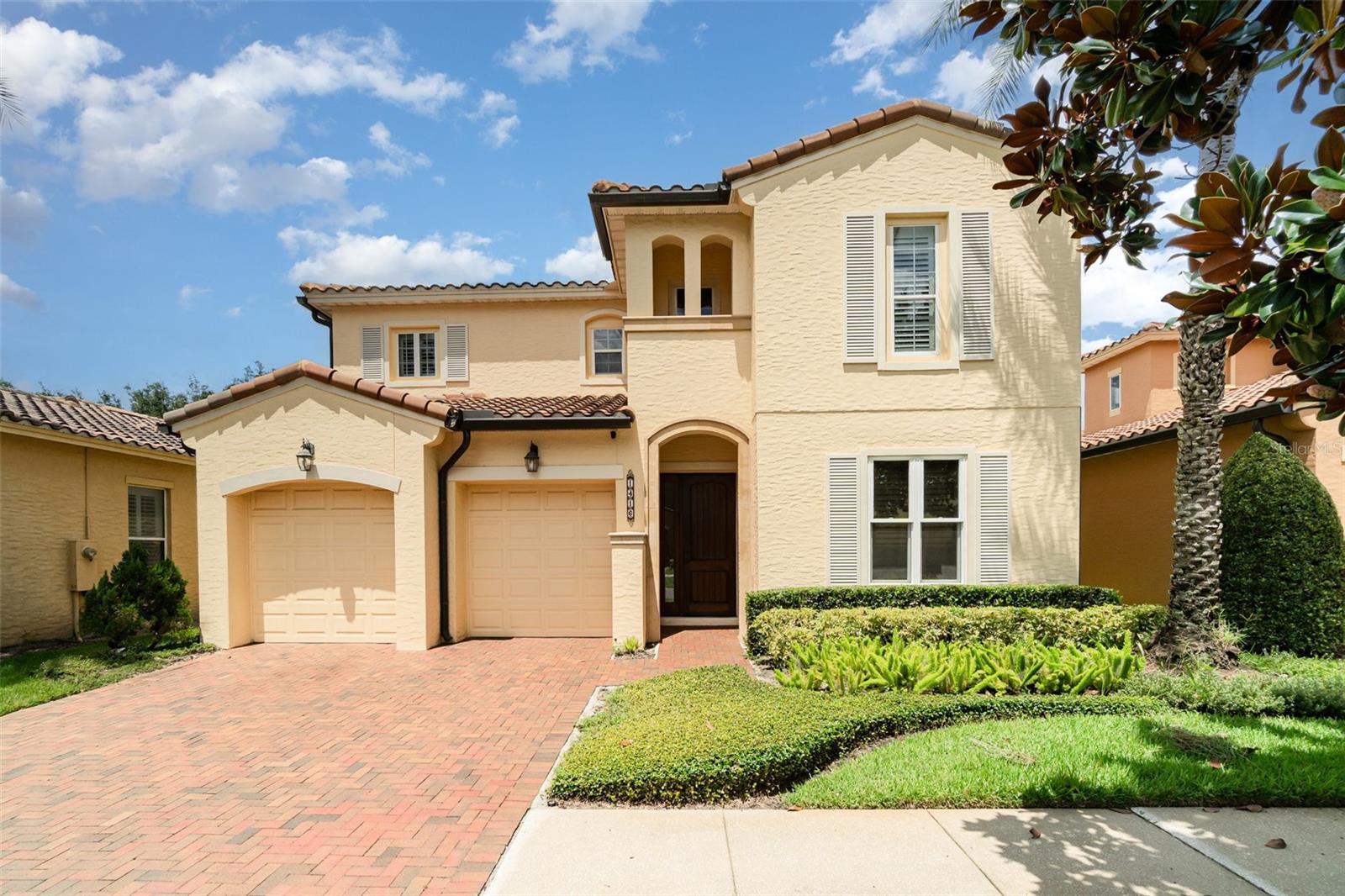 Beautifully maintained Maitland home in the gated community of Montacino on Lake Charity. Conveniently located near Maitland City Center, Park Ave, Downtown Orlando, and RDV Sportsplex. Engineered hardwood floors lead from the entry to a formal living and dining room, powder bath, and into the great room with soaring ceilings open to the kitchen and patio. The gourmet kitchen features custom cabinetry, granite countertops, and stainless appliances. The first-floor owner’s suite offers French door access to the private patio, custom closets, and a spa-style bath with dual vanities, soaking tub, and walk-in shower. Upstairs, find three additional bedrooms (one ensuite) and a loft flex space overlooking the great room. Additional highlights include a new brick paver driveway, Pella windows and sliding doors, Carrier A/C, LED lighting, custom patio tile, and epoxy garage flooring. Private backyard with no rear neighbors plus community pool and maintenance-free lawn care.