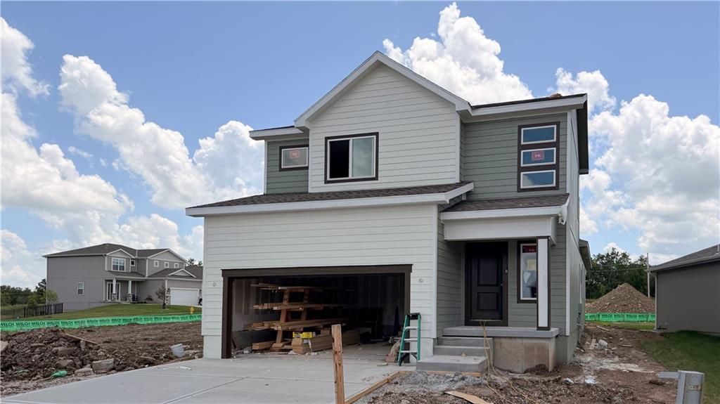 *Ready in late September!  The NEW Jasmin 1.5 story by Avital Homes.  Traditional farmhouse exterior & thoughtful design come together to create a space that's refreshing & functional.  A soaring 2-story foyer with beautifully wainscoted walls welcomes you to an open & bright main level perfect for both quiet connection or group entertaining. The generous living room with stylish fireplace wall flows seamlessly into the dining area and kitchen where a large center island & walk-in pantry, abundant soft-close cabinetry & designer upgraded finishes provide both beauty and practicality.  Tucked privately at the back, a primary suite with stunning trimmed accent detail offers a relaxing retreat with a well-crafted ensuite bath and generous closet space. Just off the garage entry, a convenient mudroom with built-in bench and adjacent laundry room accessible from the primary closet keeps daily life organized and efficient. Upstairs, you’ll find three surprisingly large secondary bedrooms equipped with a walk-in closets, along with a large double-vanity full bath and a versatile loft area ideal for central study space, a play area or even a book nook. The open-to-below balcony design enhances the entry’s light and airy feel, while stepping outside to the large covered patio you'll find the spot for relaxing evening lounging and outdoor dining.   The home is equipped with energy-efficient lighting, high efficiency HVAC and water heater, Low-E windows, soft-close cabinetry throughout, fully insulated garage and the confidence of 1/2/10 year warranties. Think about adding a 940sqft lower level finish with a 5th bedroom, 4th bath, and large rec room to make this home 3120sqft total!  Located in sought-after Creekmoor, residents enjoy a championship golf course, the best clubhouse and amenities complex in KC with 3 pools, a fitness center, tennis/pickleball/basketball courts, walking trails, stocked lake, convenient access to shopping, dining, & everyday essentials and more!